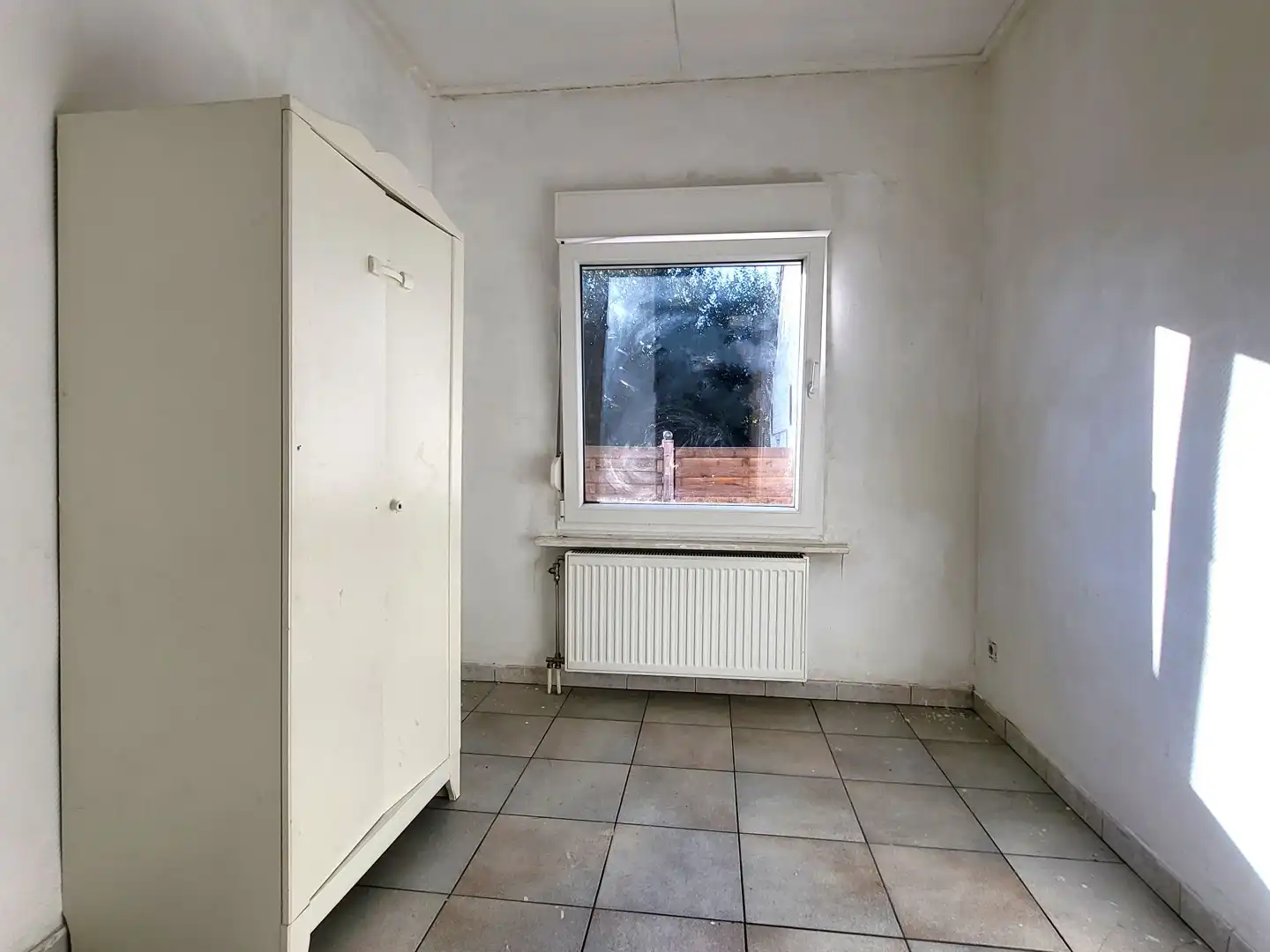 Halfopen bebouwing met 3 slaapkamers en zonnig tuintje in rustige dorpskern. foto 14
