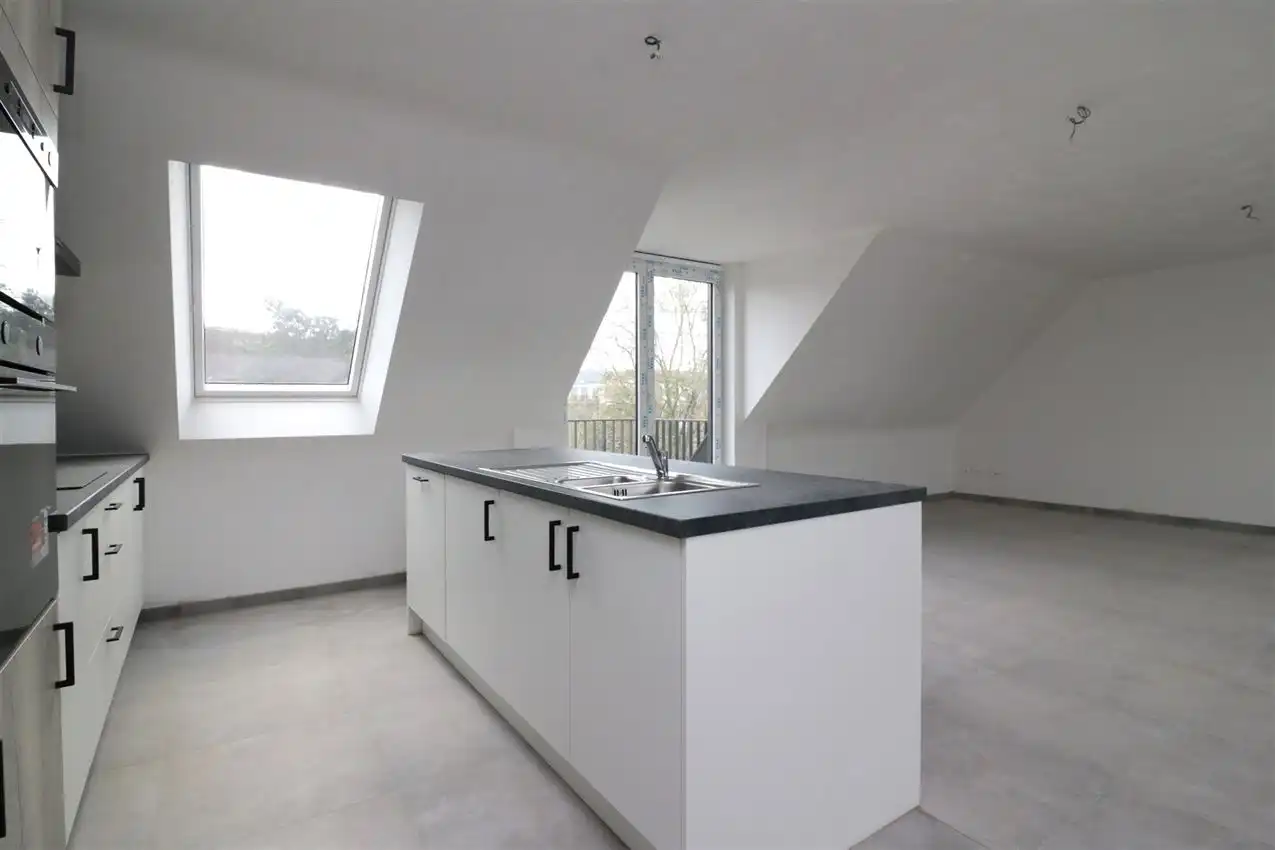 Uniek penthouse in centrum Aarschot met 1 slpk. parking en terras foto 2