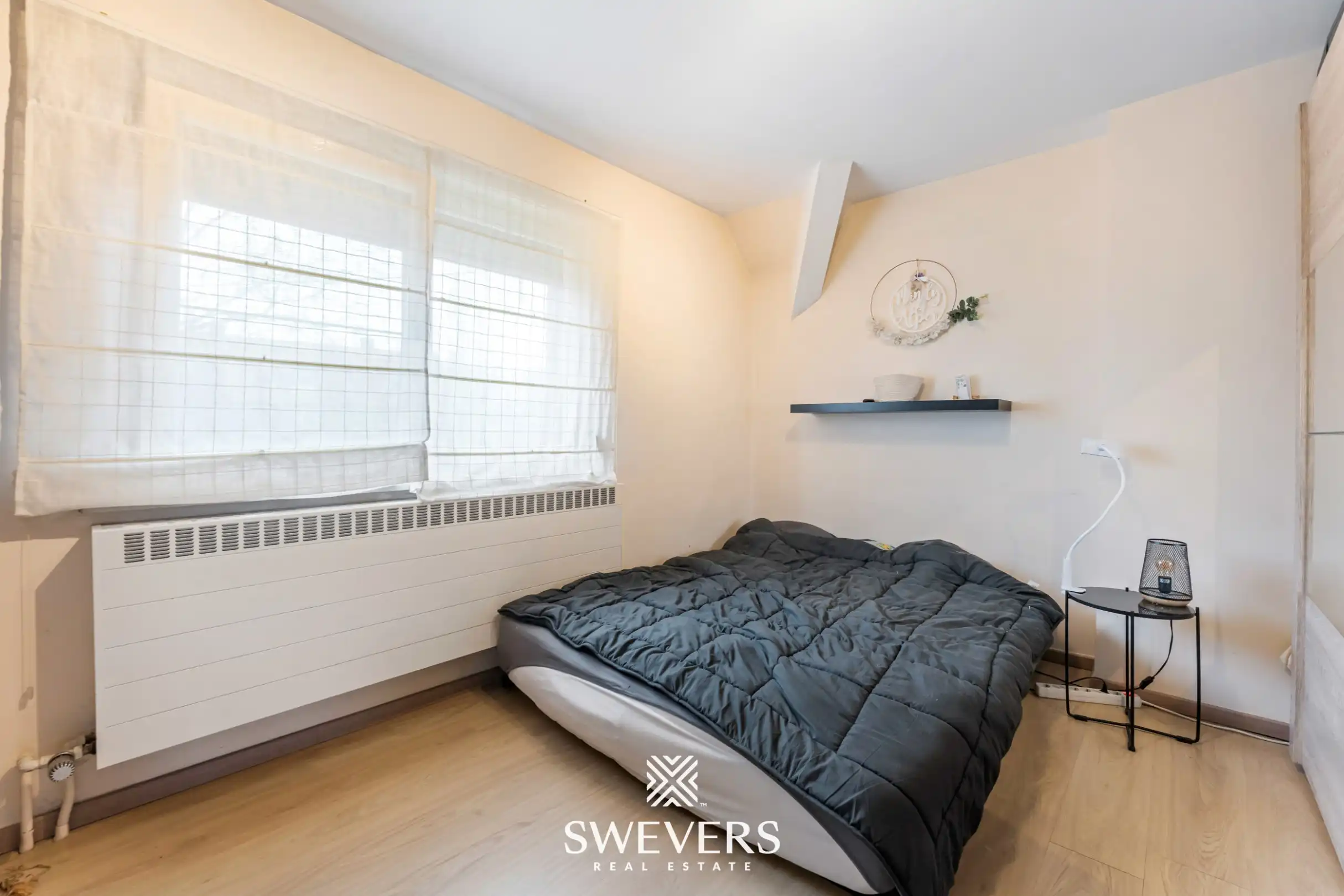 Instapklare gezinswoning met privacy en ideale ligging in Genk foto 16