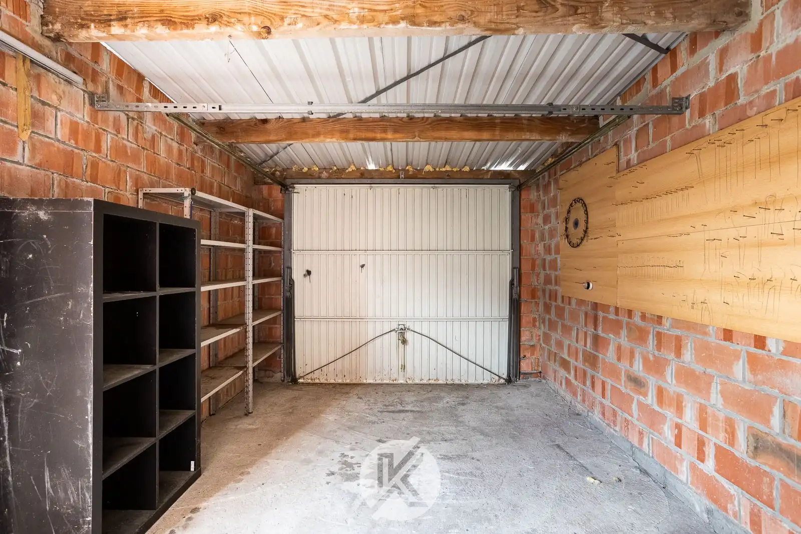 Te renoveren woning met garage foto 19