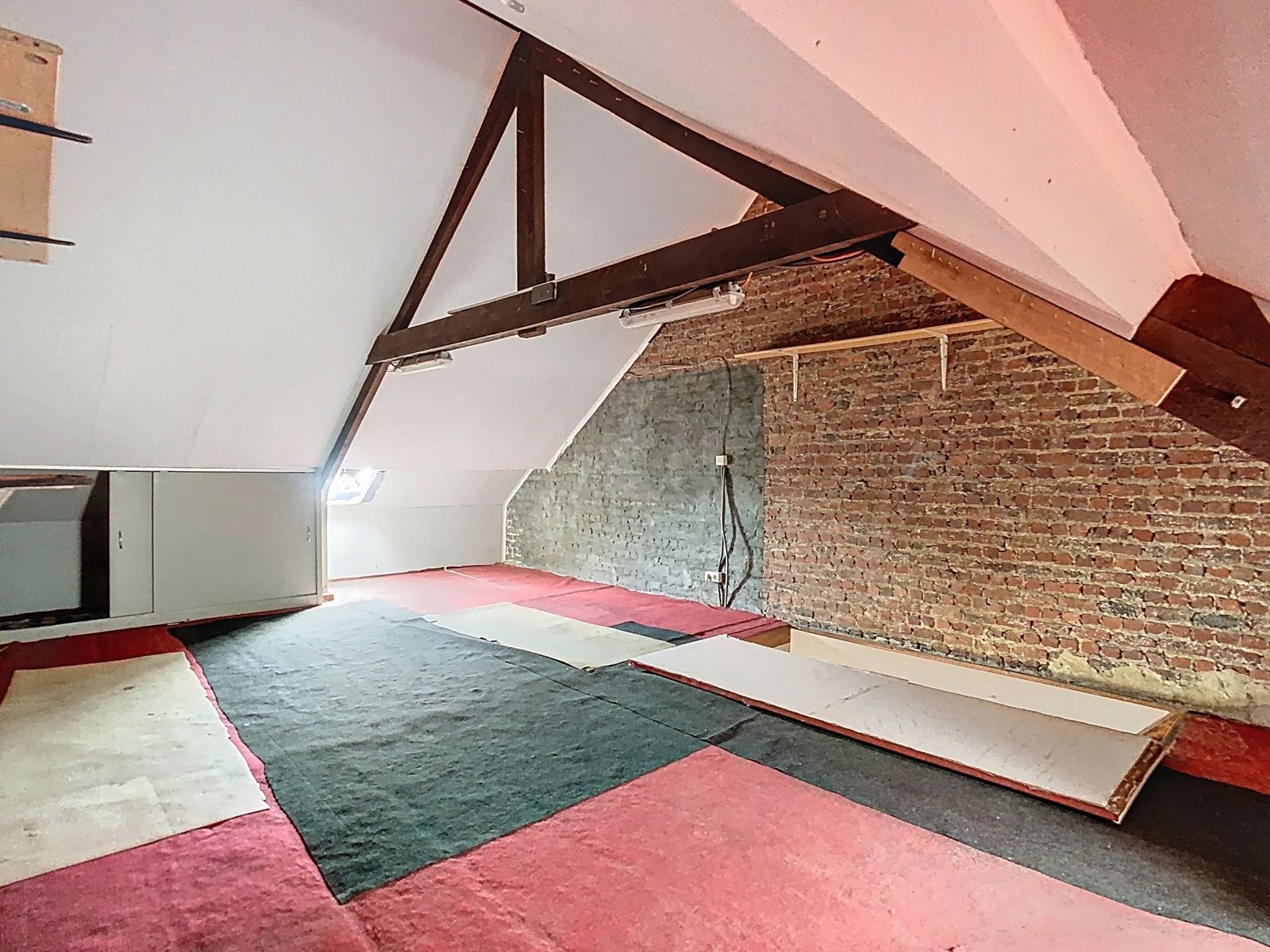 Mooie stadswoning met 2 SLPK,tuin en optionele garage! foto 17