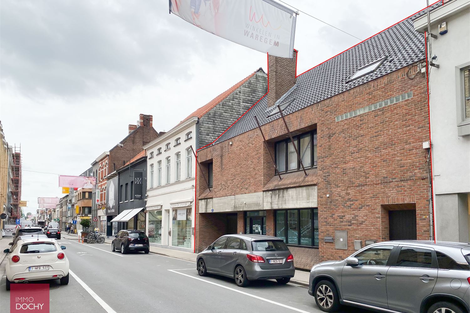 Multifunctioneel commercieel gebouw met parking en uitweg | Stationsstraat foto 2