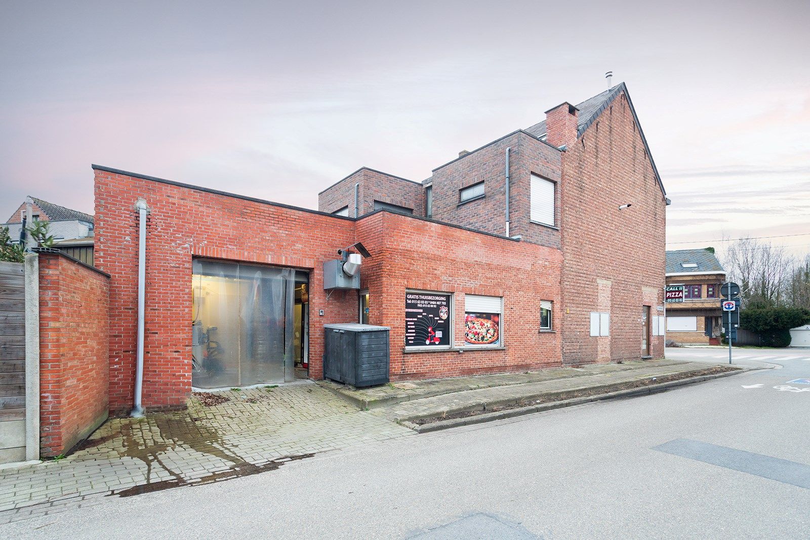 Handelspand met duplex appartement en garage op toplocatie foto 12