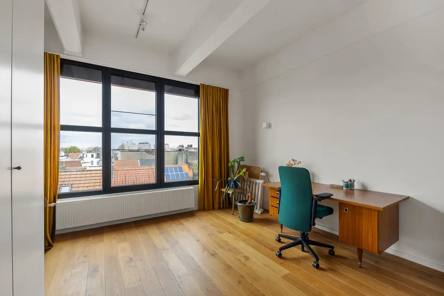 Een woning in de lucht: 'Uitzonderlijke loft 200m² + aangelegde daktuin, terras en 2 optionele garages in rustig, groen woonerf op de grens Borgerhout/Antwerpen' foto 14