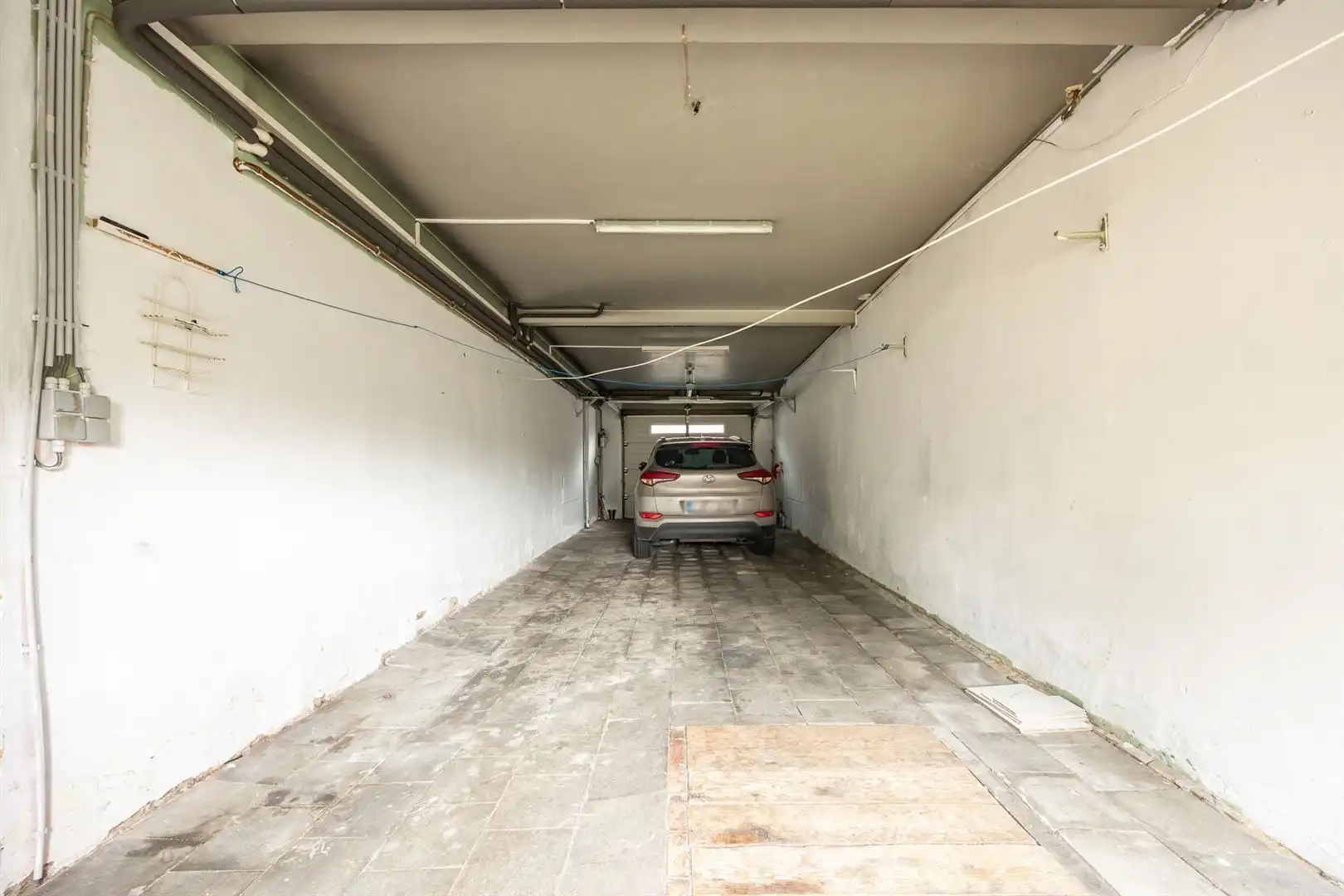 Ruime gezinswoning met zonnige tuin en renovatiepotentieel foto 25