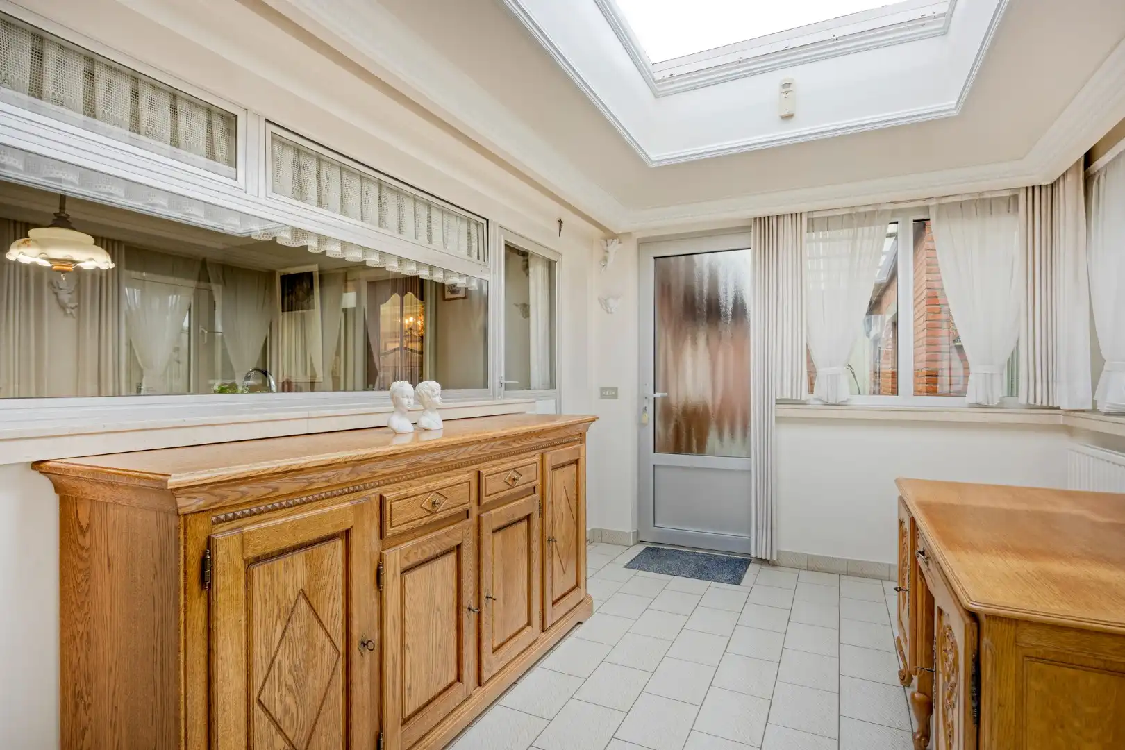 Ruim ingedeelde gelijkvloers woning op een mooi breed perceel van 812 m². foto 15