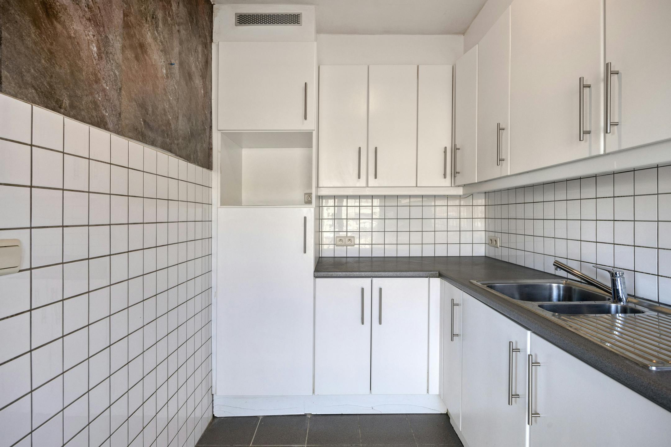 Startersappartement met 2 slaapkamers en garage in Boom foto 4