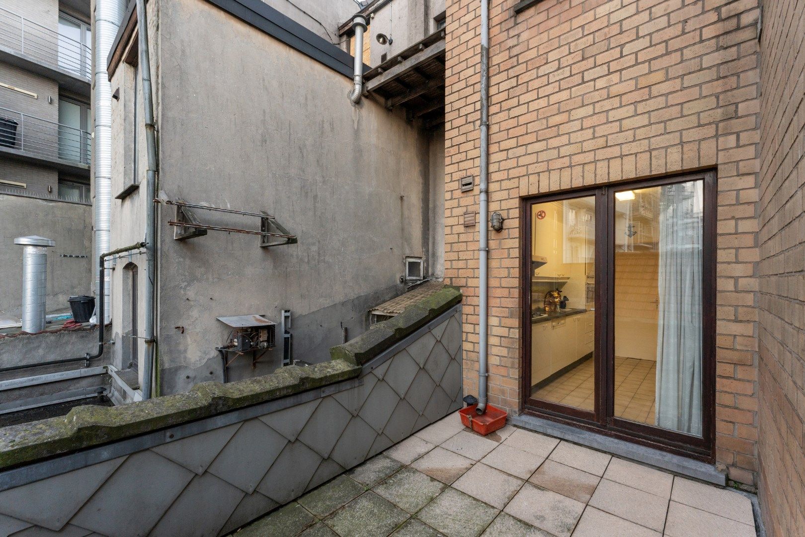 OPBRENGSTEIGENDOM : handelspand met duplex appartement. foto 14