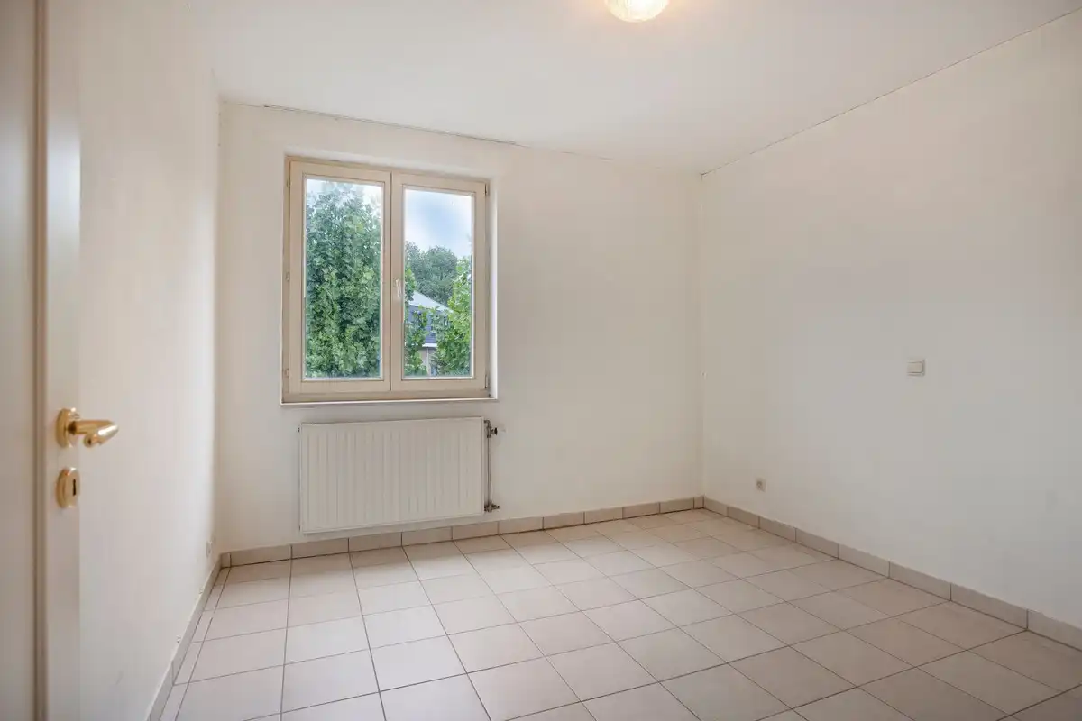 Ruim 2 slaapkamer appartement in het hartje van Koksijde met aankoopmogelijkheid van een garage foto 12