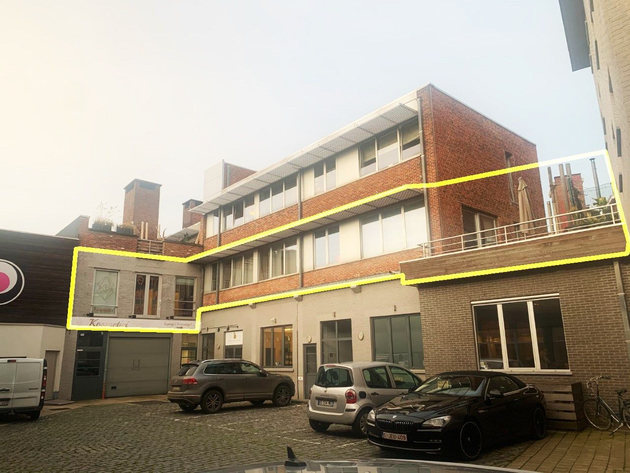 Zeer ruime loft met terras (263m2) in centrum Kortrijk foto {{pictureIndex}}