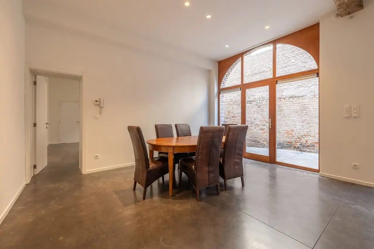Ruim gelijkvloers appartement met zonnige tuin op toplocatie foto 12