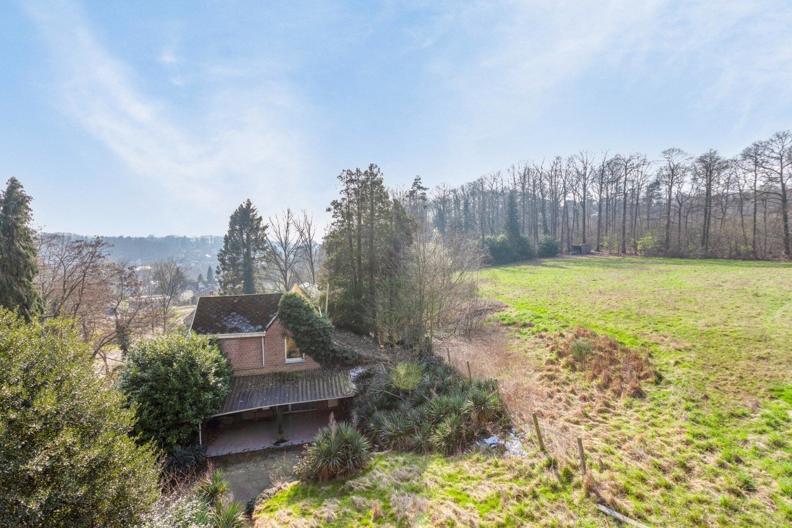 Hoofdfoto van de publicatie: Uniek project: te renoveren woning op een perceel van bijna 1 hectare in Kessel-Lo.