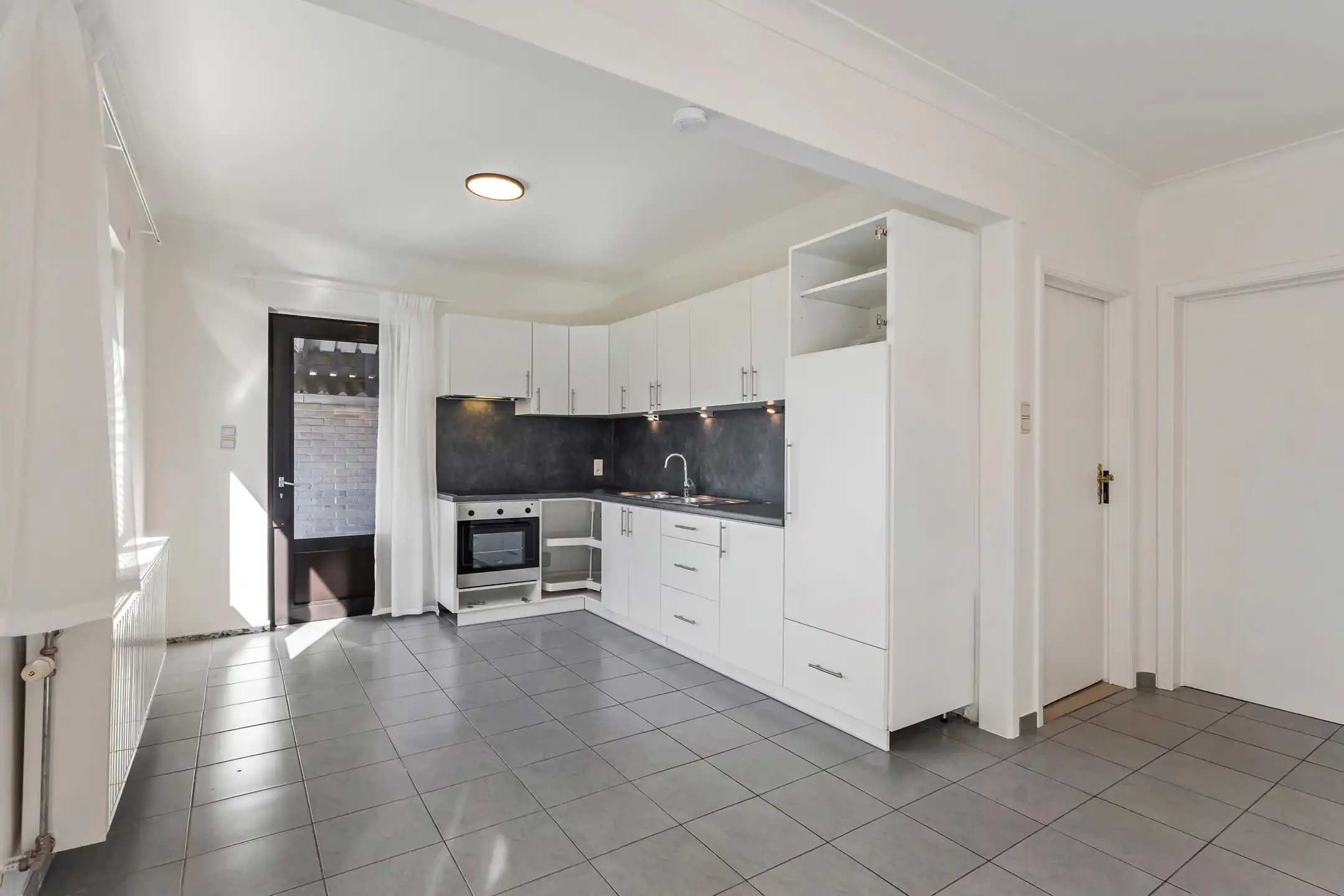 Charmante woning met terras te Riemst.  foto {{pictureIndex}}