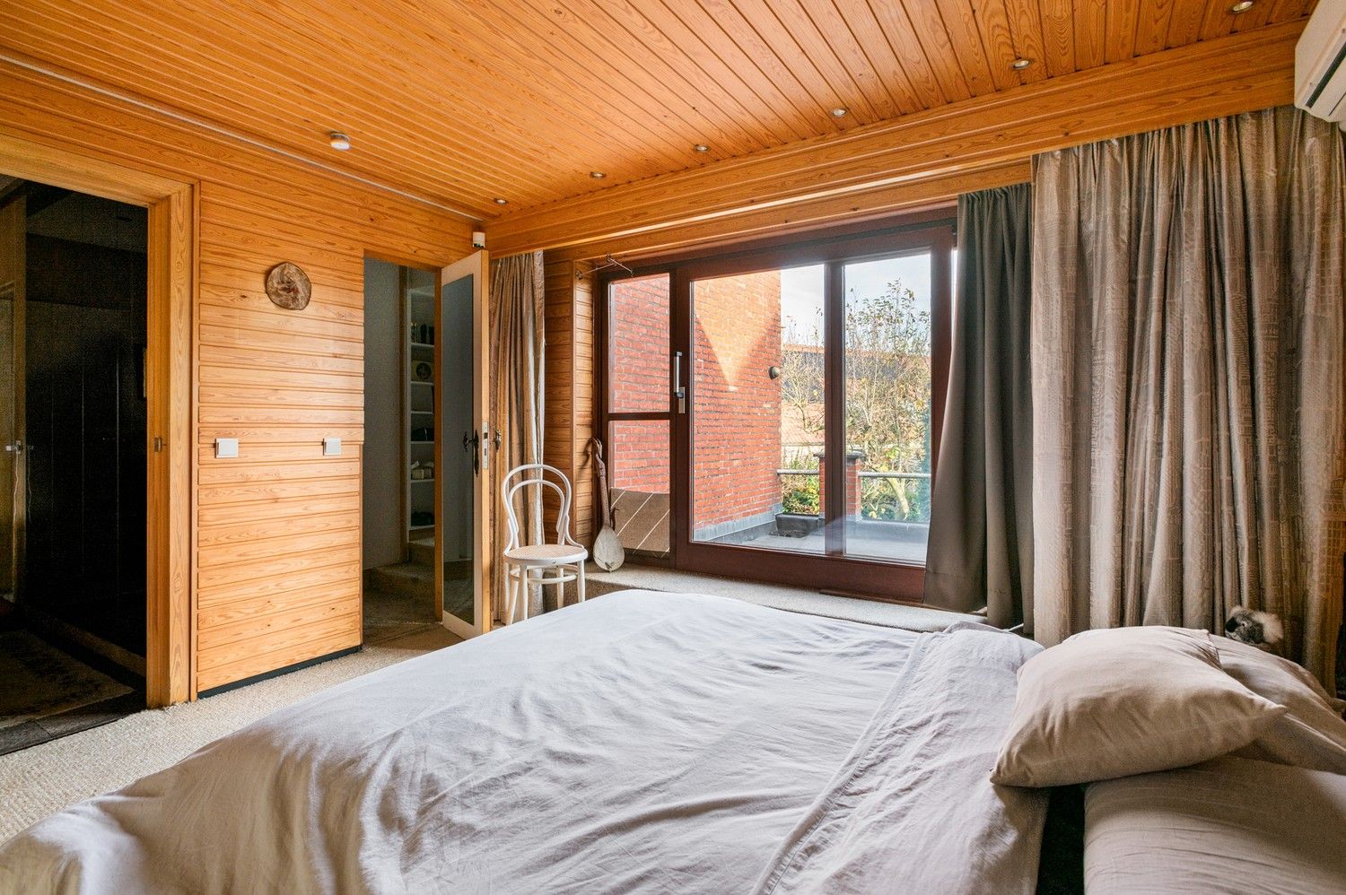 Karaktervolle halfopen woning met garage, oprit en gezellige tuin nabij het centrum van Borsbeek! foto 15