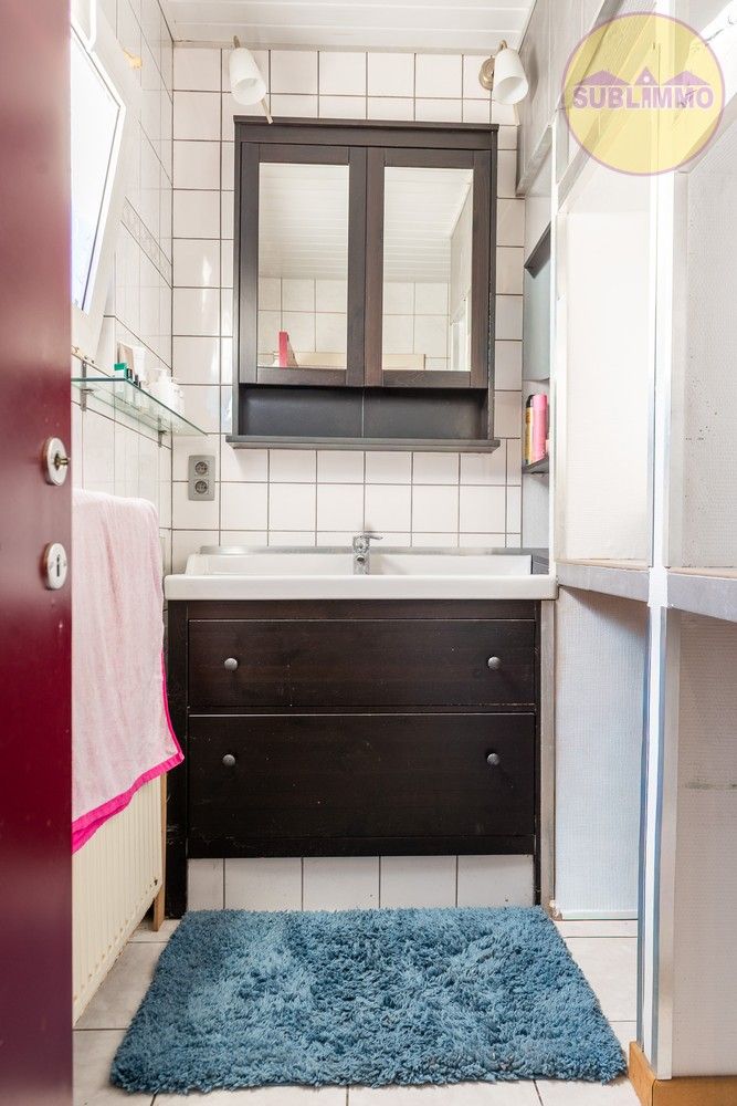 Handelspand met woonst + 4 garages in het centrum van Meerhout foto 7