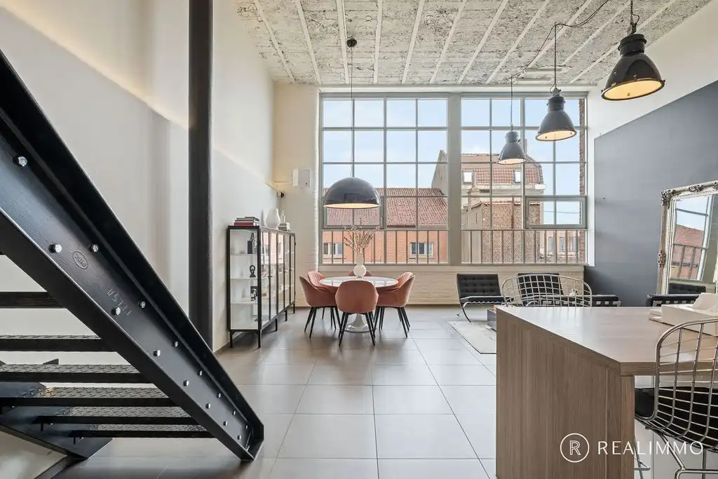 Exclusieve loft van 179 m² op iconische site “De Groote Fabrieke” in Avelgem foto {{pictureIndex}}