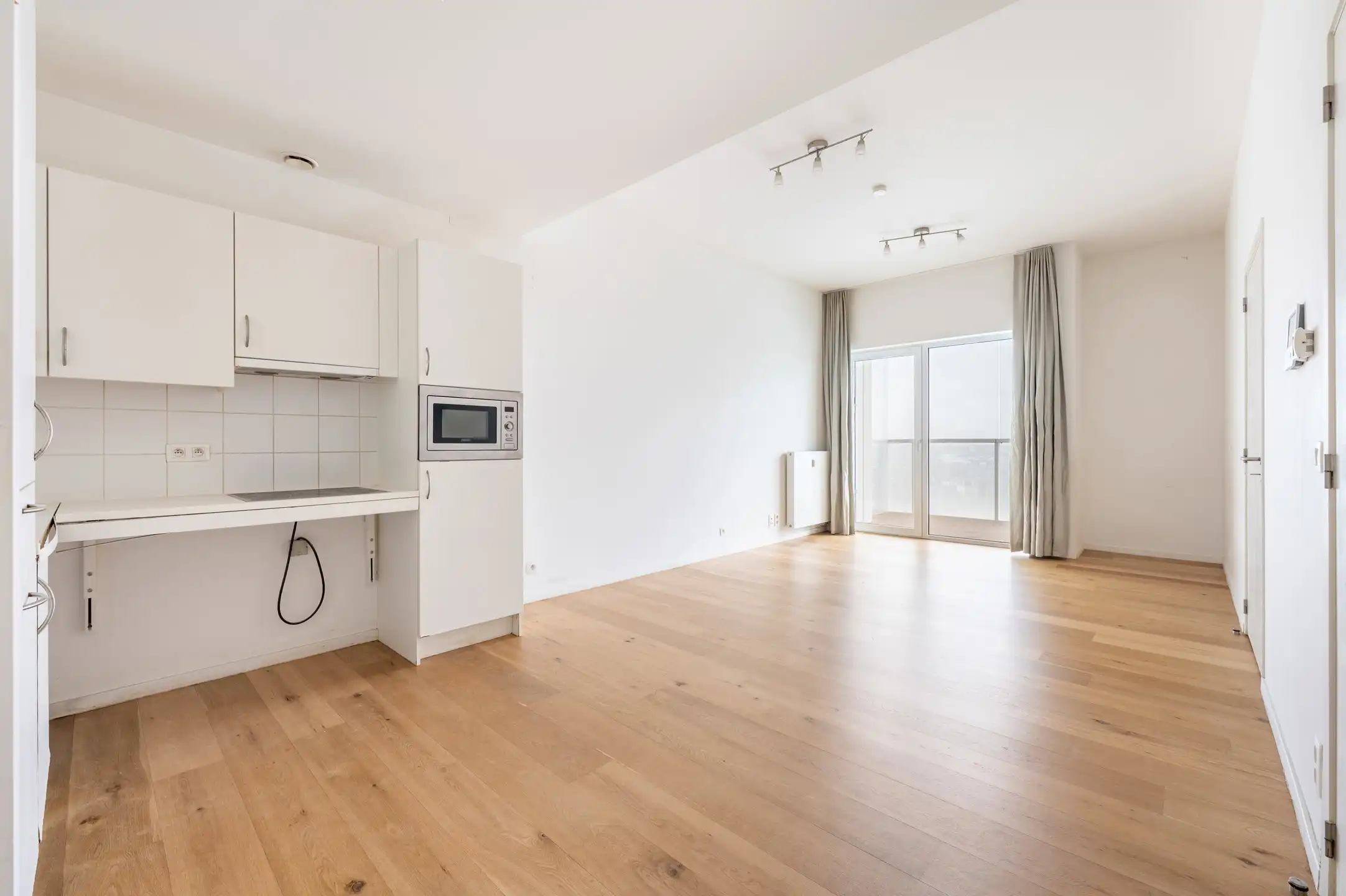 Lichtrijk appartement met terras en EPC A foto 4