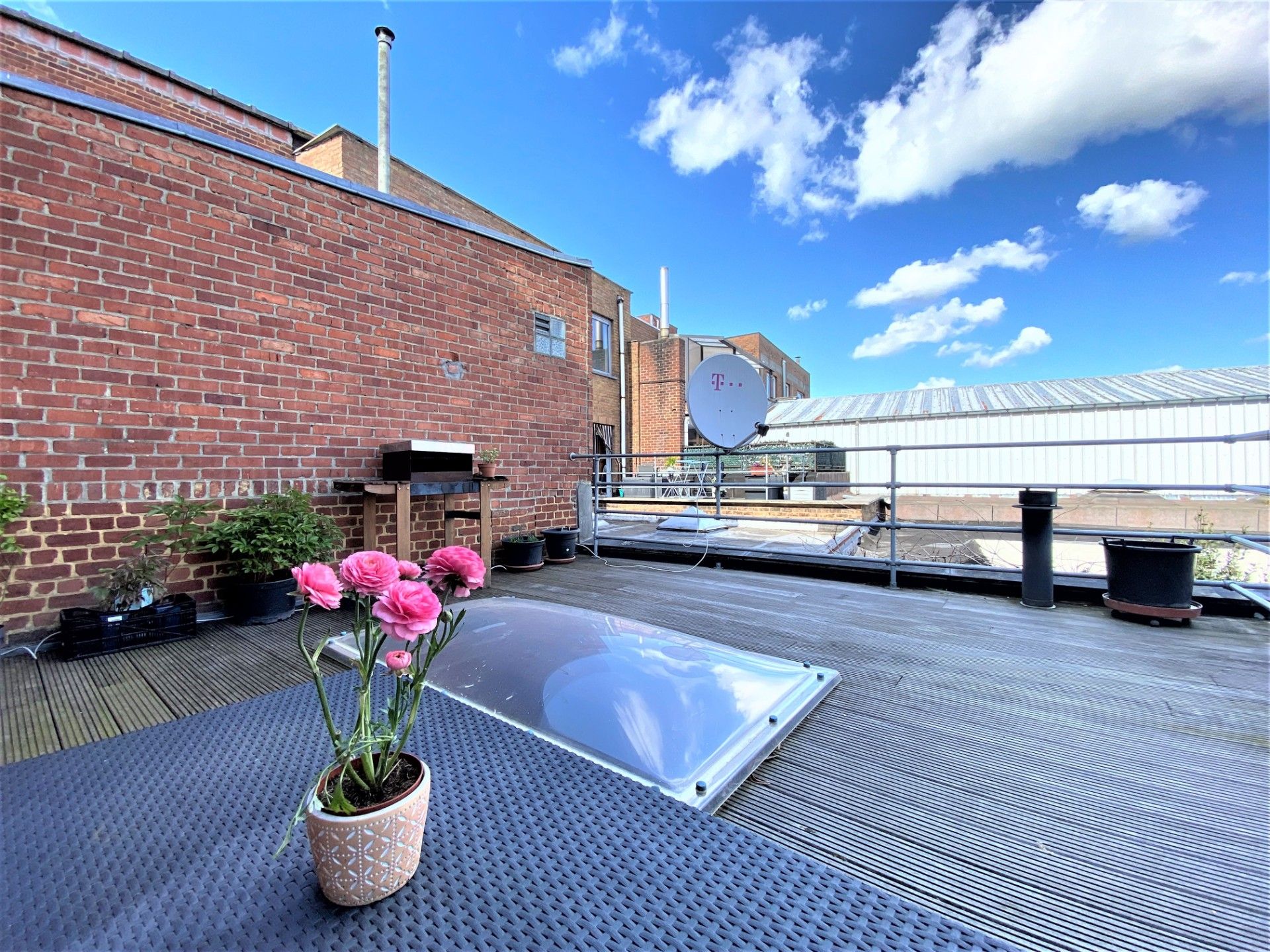 Leuke rijwoning met inpandige garage en zonnig terras in centrum Brakel foto 10