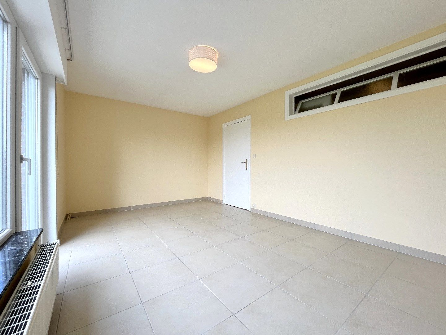 Lichtrijk 3-slpkr appartement met garage foto 21