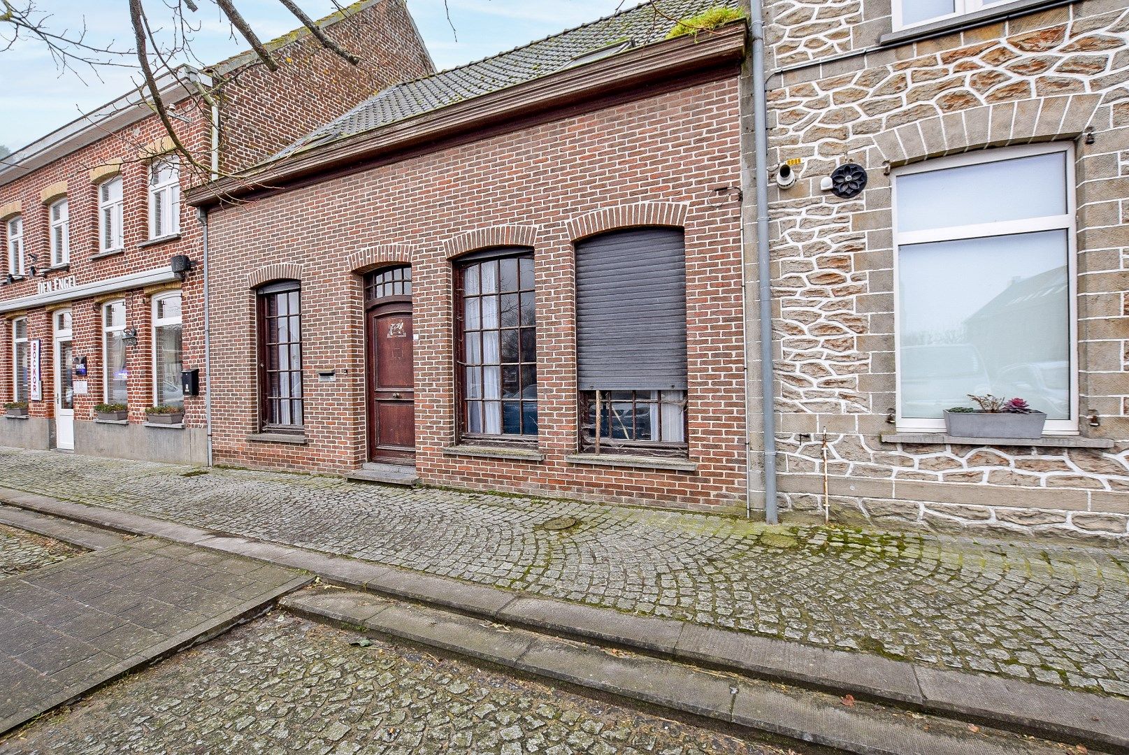 Te renoveren woning met 3 slaapkamers en zongerichte tuin. foto 3