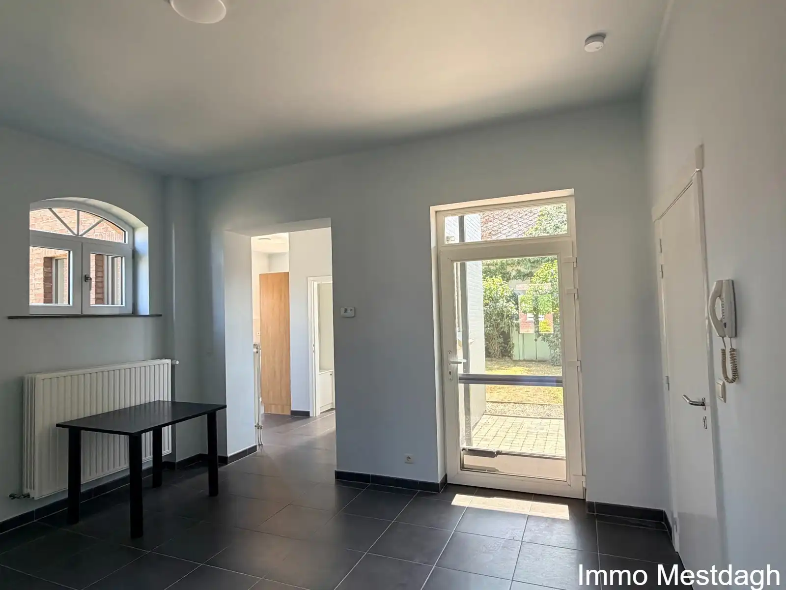 Prachtig gerenoveerd gelijkvloers appartement met terras en tuin in centrum Rummen foto 6