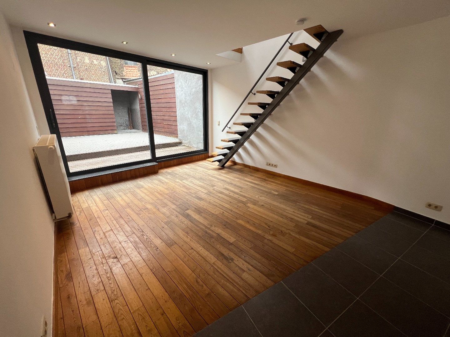 Moderne rijwoning met 1 slaapkamer en zeer ruim terras foto 5