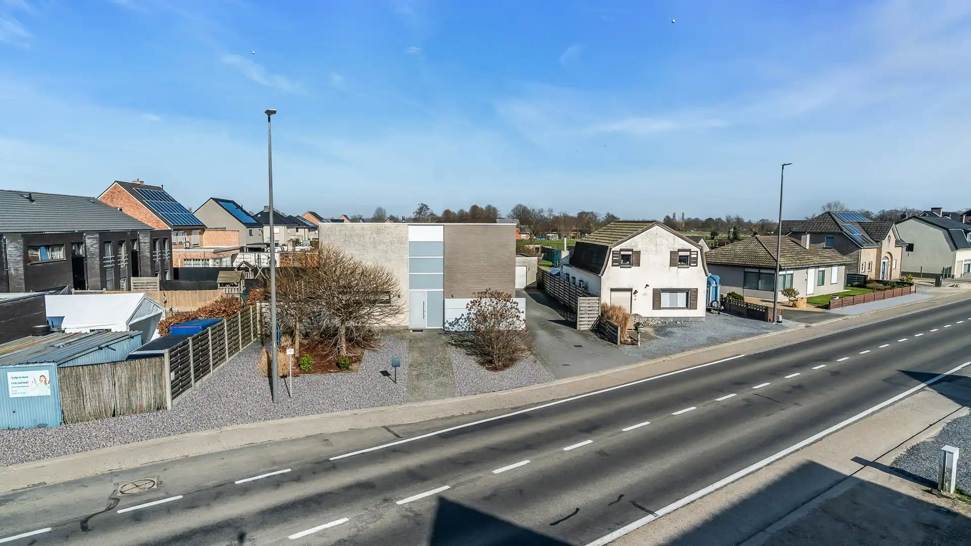 Trendy gezinswoning met open leefruimte, 4 slaapkamers en vrijstaande garage foto 2