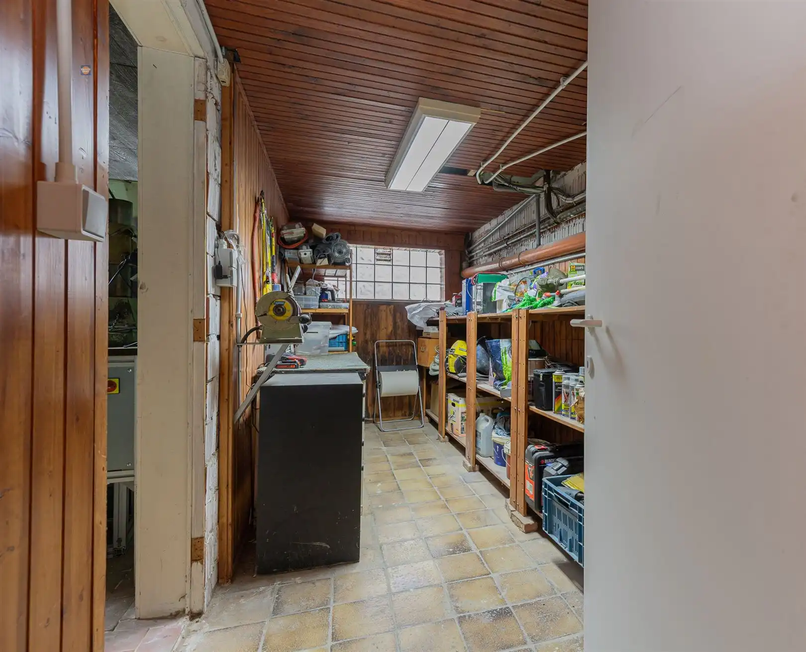 Ruime bel-etage met 3 slaapkamers, grote garage en gezellige tuin foto 18