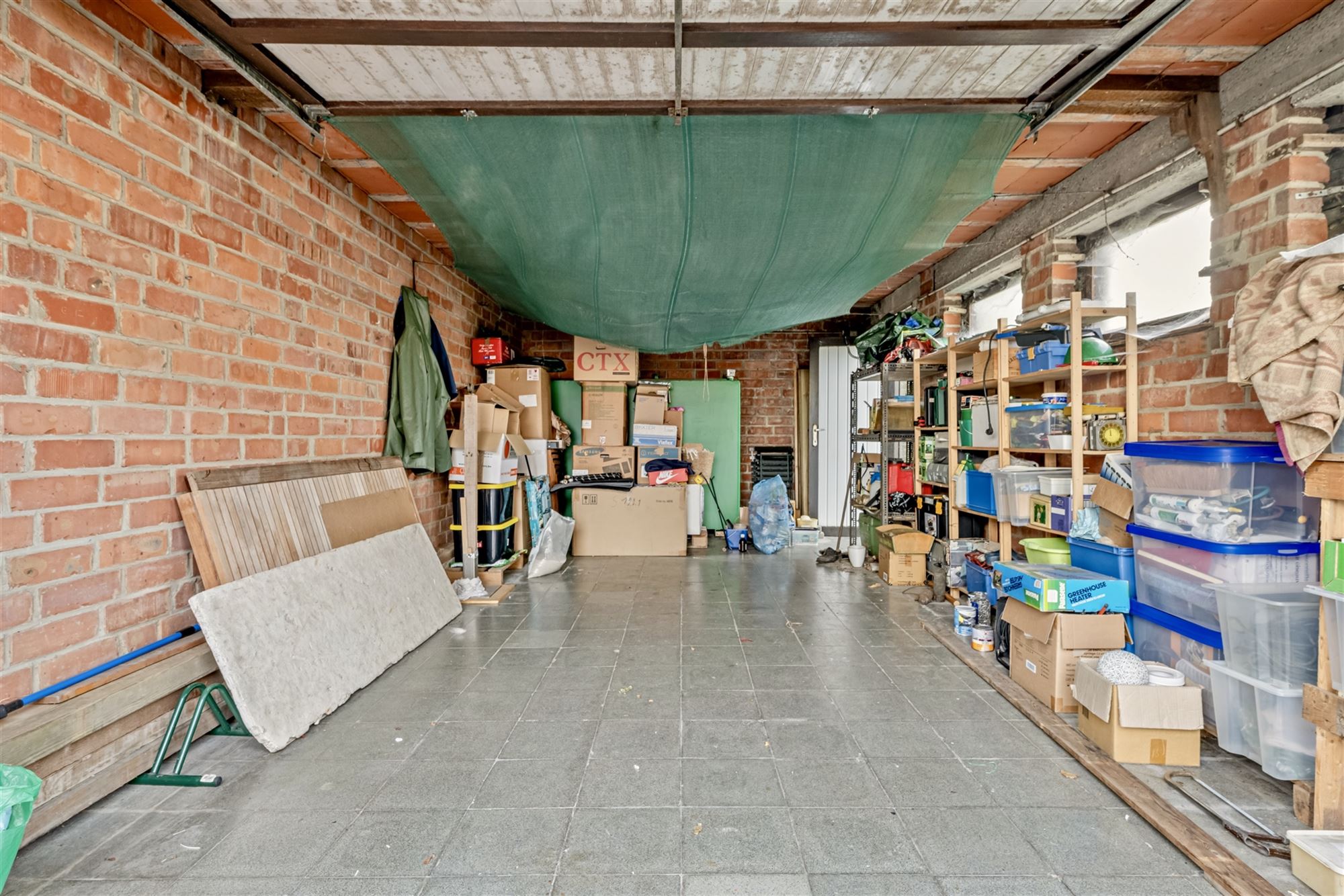 Heel solide bungalow met 4 slpks, tuin en garage foto 22