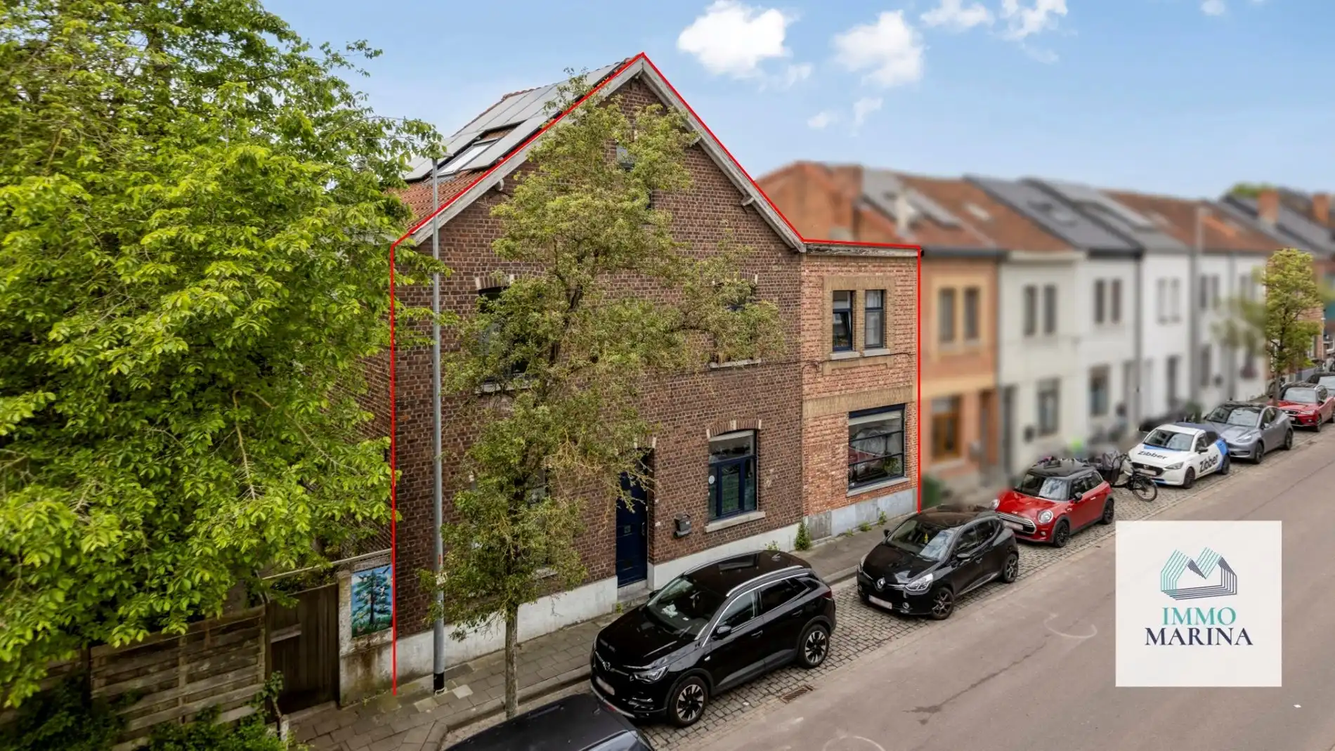 Zeer ruime karakterwoning met 9 kamers en tuin op toplocatie te Leuven foto {{pictureIndex}}