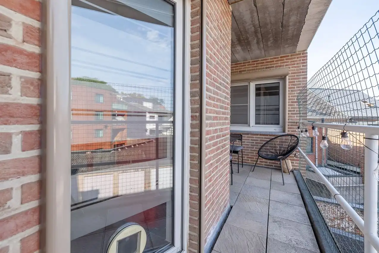 Appartement met twee slaapkamers, terras en autostaanplaats te midden van centrum foto 10