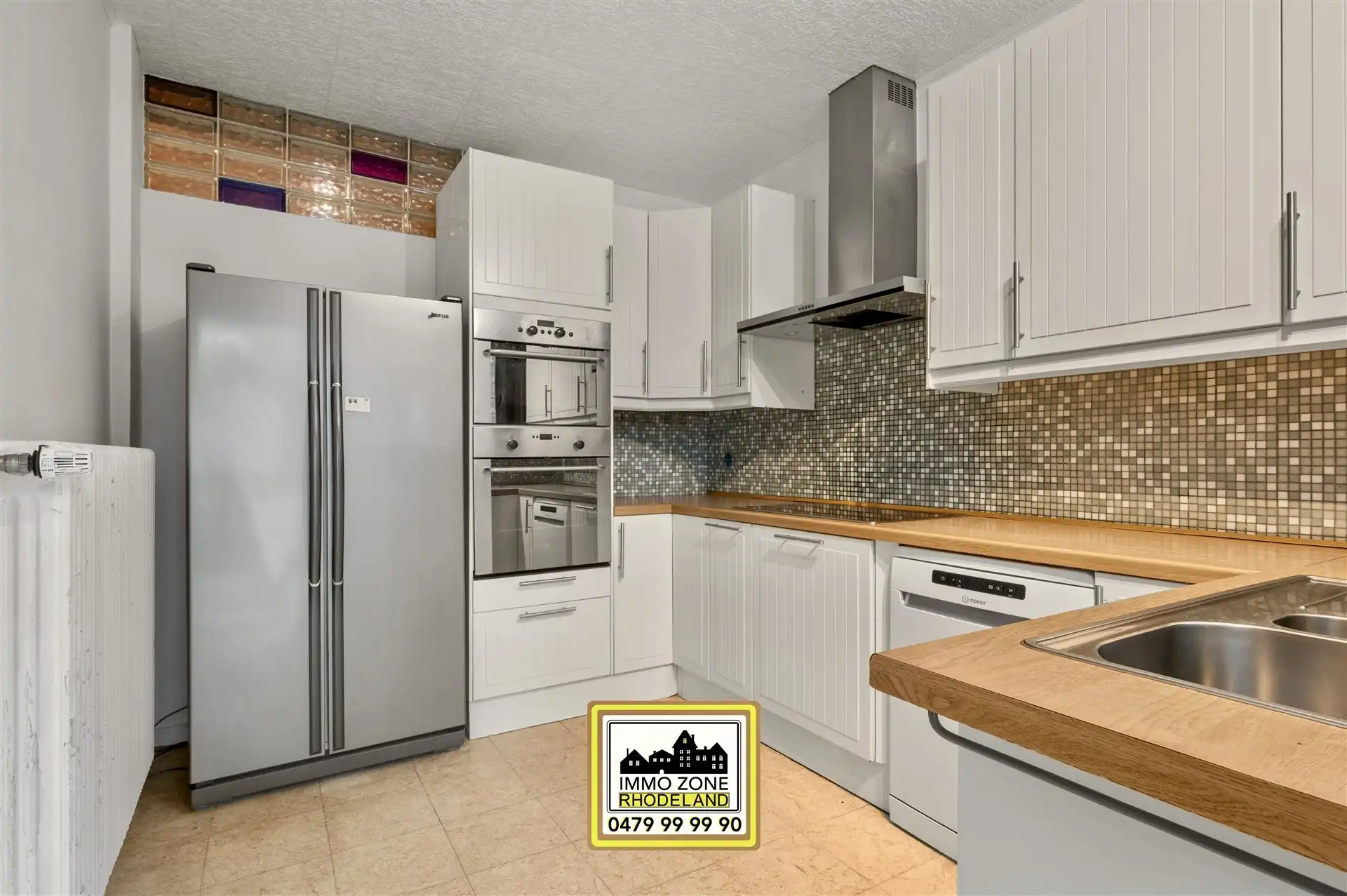 Op te frissen woning met 3 slpks, inpandige garage en tuin foto 15