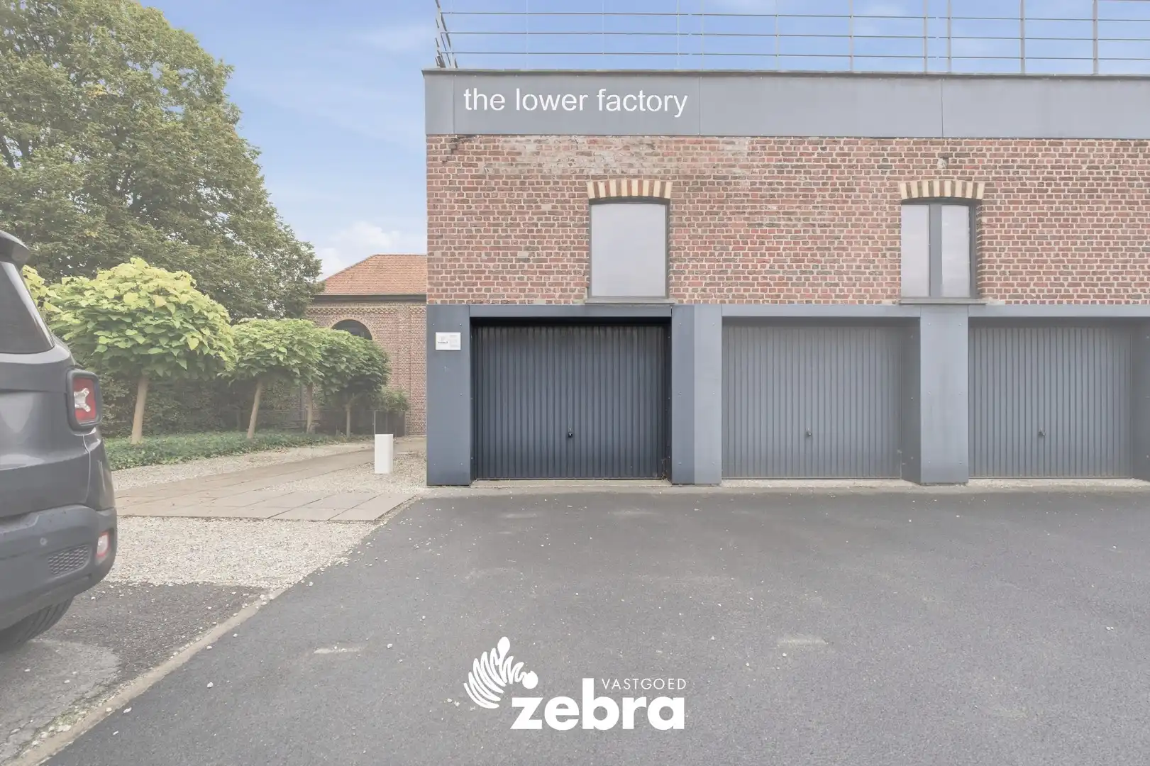 Unieke instapklare loft met twee ruime terrassen, garage en privatieve parkeerplaats in Ardooie! foto 3