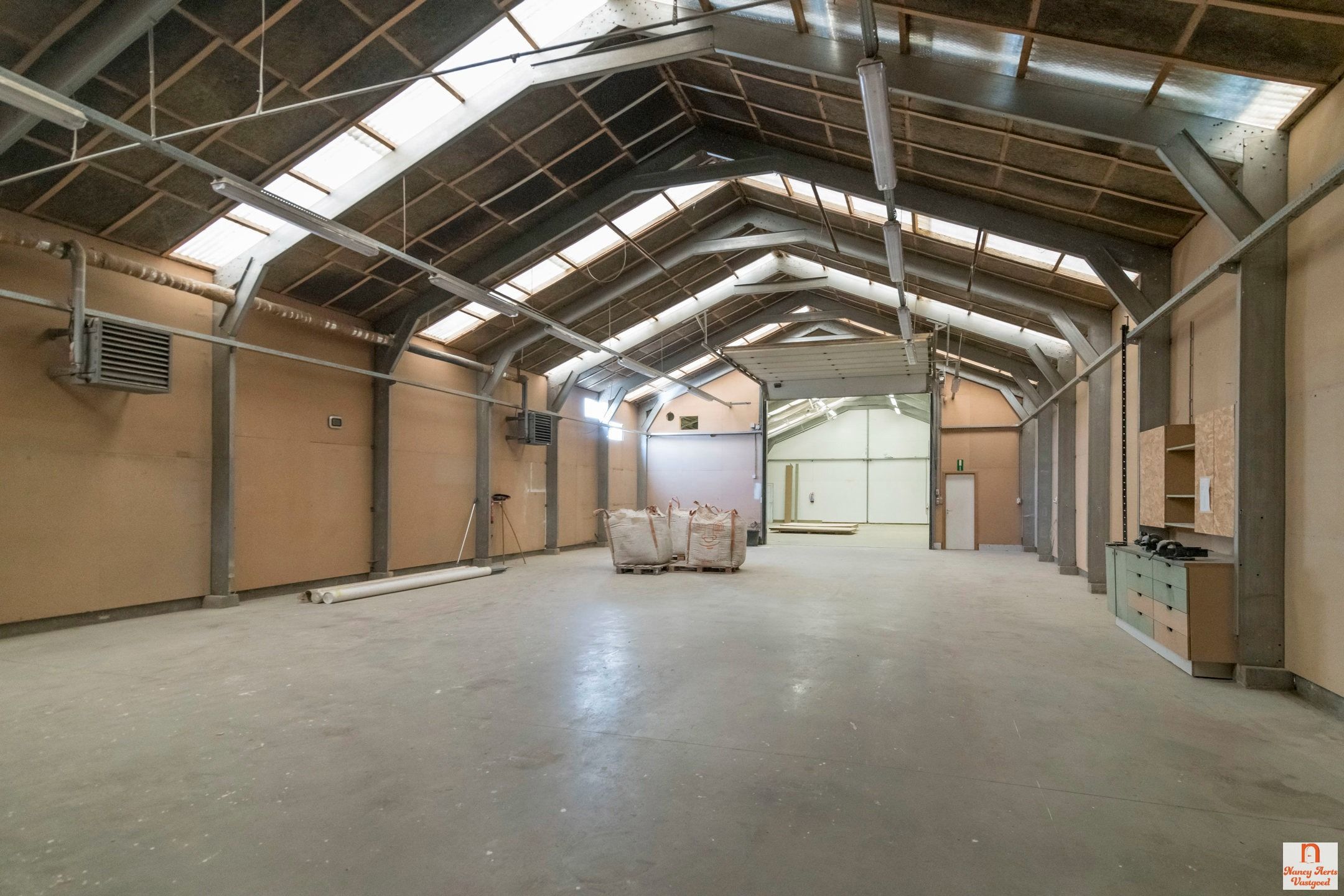 Magazijn van 550m² op industrie - optie huur conciërgewoning foto 6