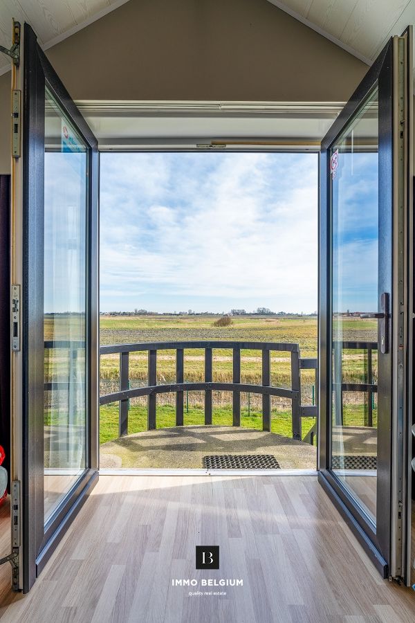 Gemeubeld vakantie appartement met zicht over de polders foto 2