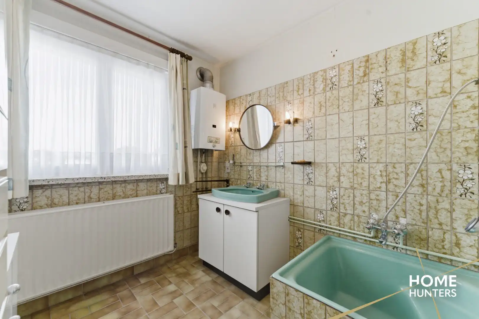 Charmante gezinswoning met zonnige tuin op toplocatie in Ieper foto 16