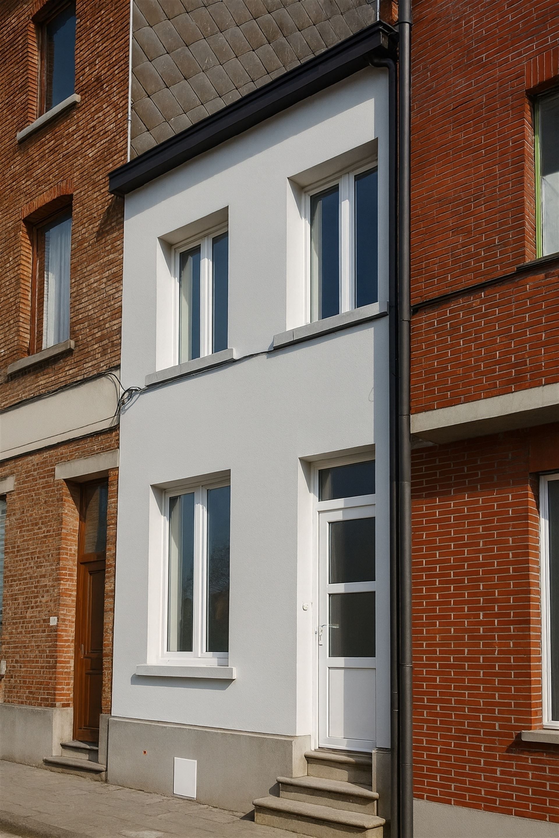 Instapklare stadswoning met 2 slpks en buitenruimte! foto 12