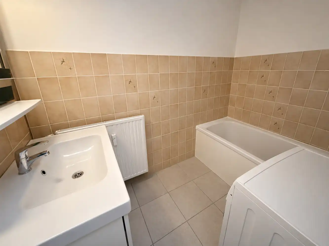 Ruim appartement te huur op de Grote Markt in Blankenberge met twee slaapkamers. Met een terrasje vooraan en achteraan- uw ideale uitvalsbasis aan de Belgische kust! foto 11