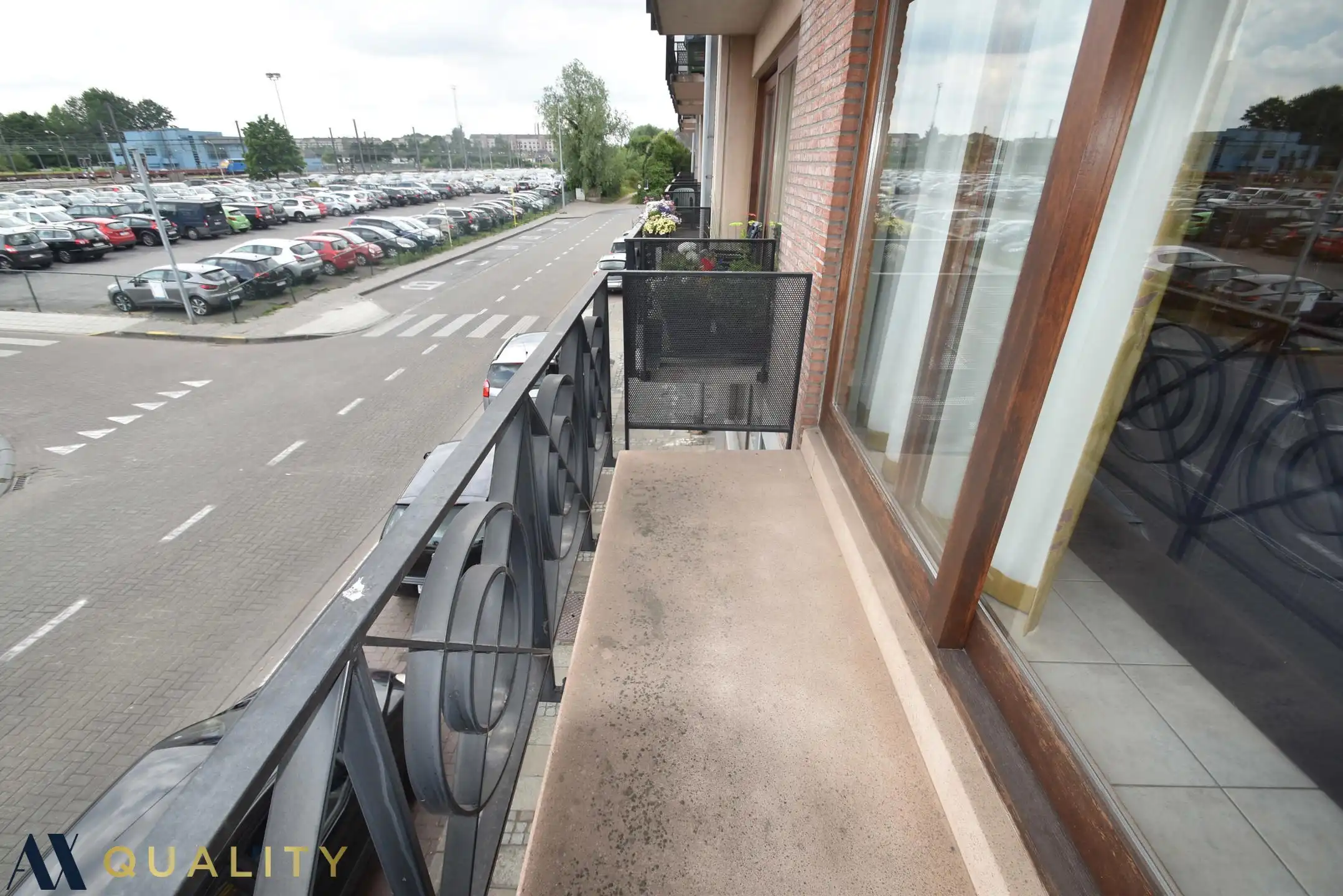 Vlakbij het station van Dendermonde: 2 slpk. appt met terras en garage, lift foto 3