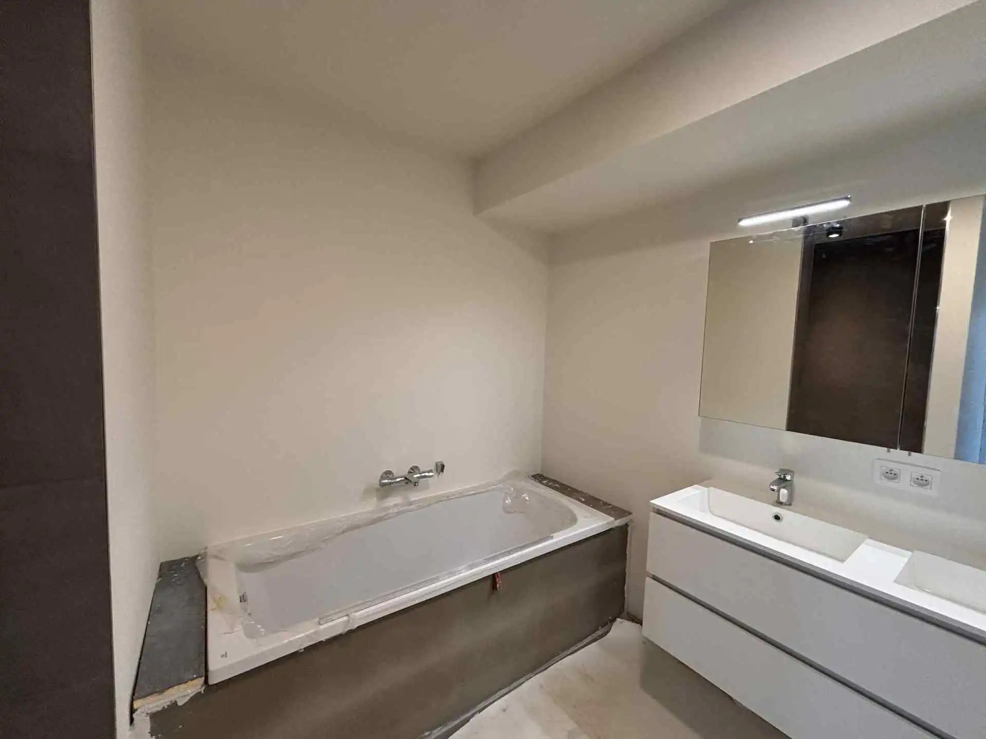 BORSBEKE - Nieuwbouw gelijkvloers appartement. foto 13