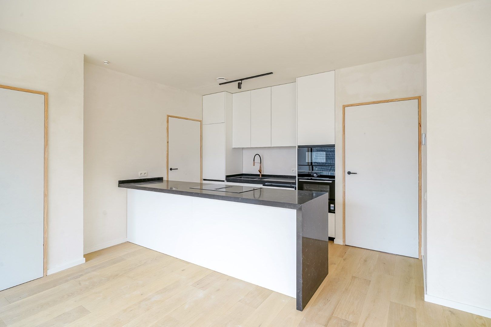 Nieuwbouwproject te Bredene bestaande uit 5 appartementen en 5 autotaanplaatsen. foto 3