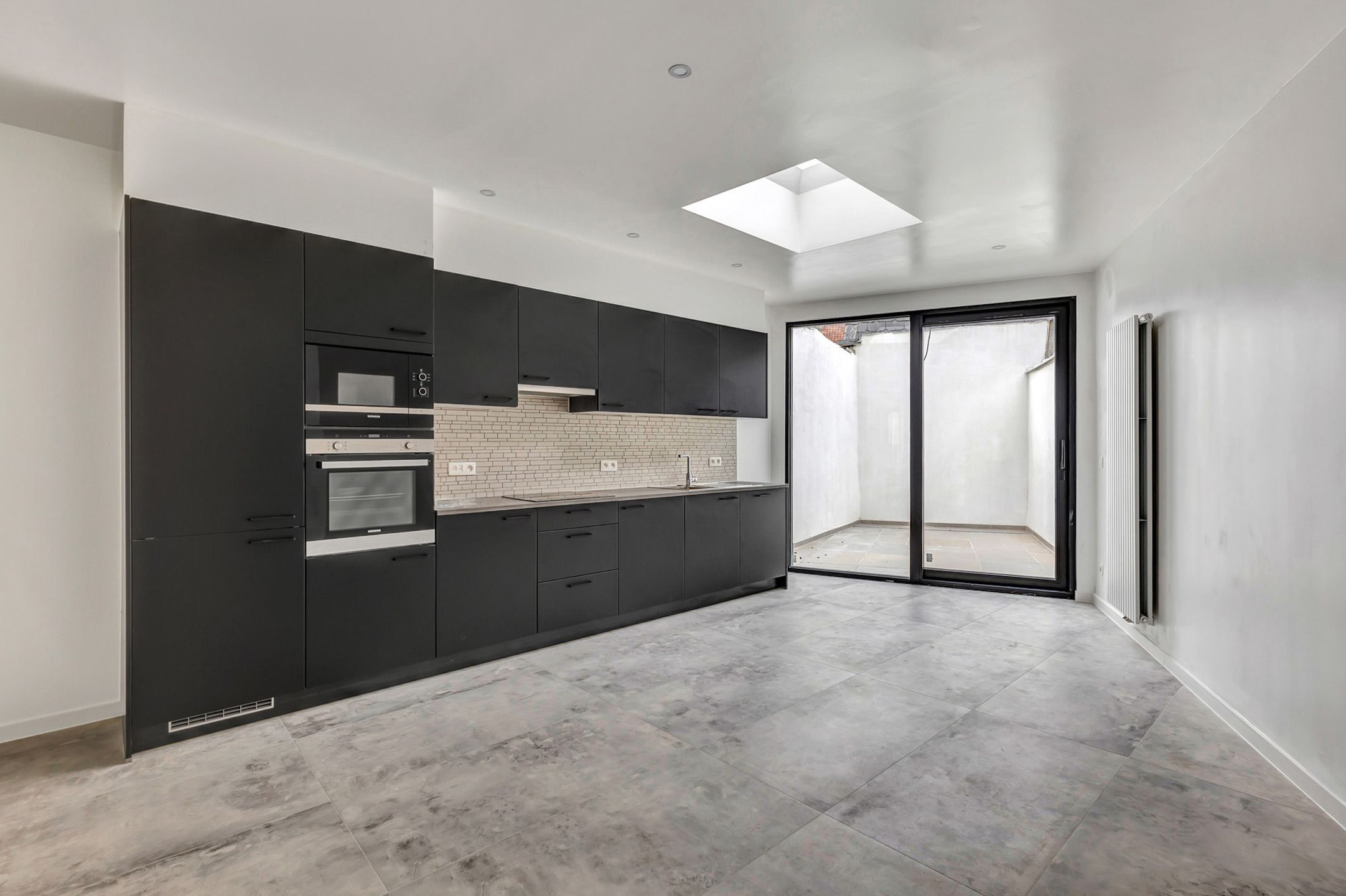 Instapklare stadswoning 200m2 bewoond met 5 slaapkamers  foto {{pictureIndex}}