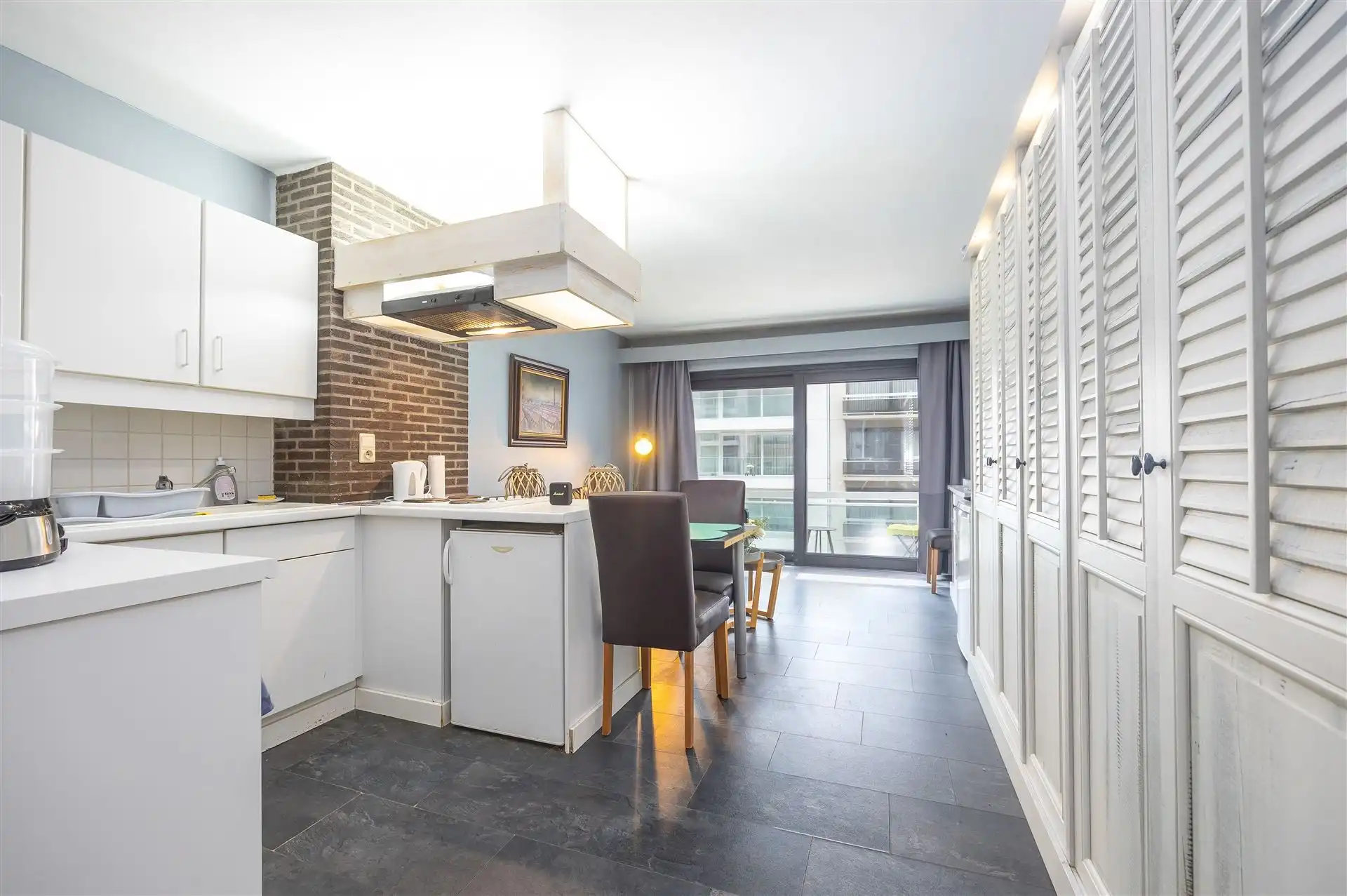 studio foto {{pictureIndex}}