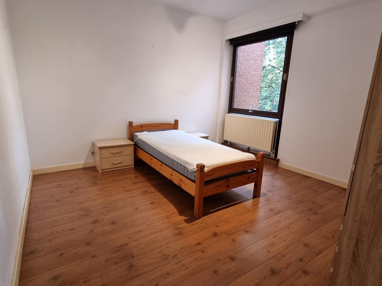 Verzorgd en ruim appartement van 97m², met 2 slaapkamers, terras aan de achterzijde en private kelderberging . foto 6