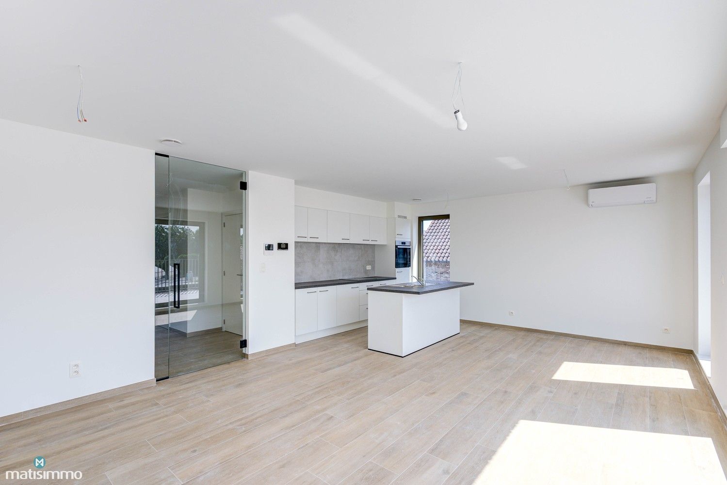 NIEUWBOUWAPPARTEMENT MET TWEE SLAAPKAMERS, RUIM TERRAS EN PARKEERPLAATS TE MUNSTERBILZEN foto 2