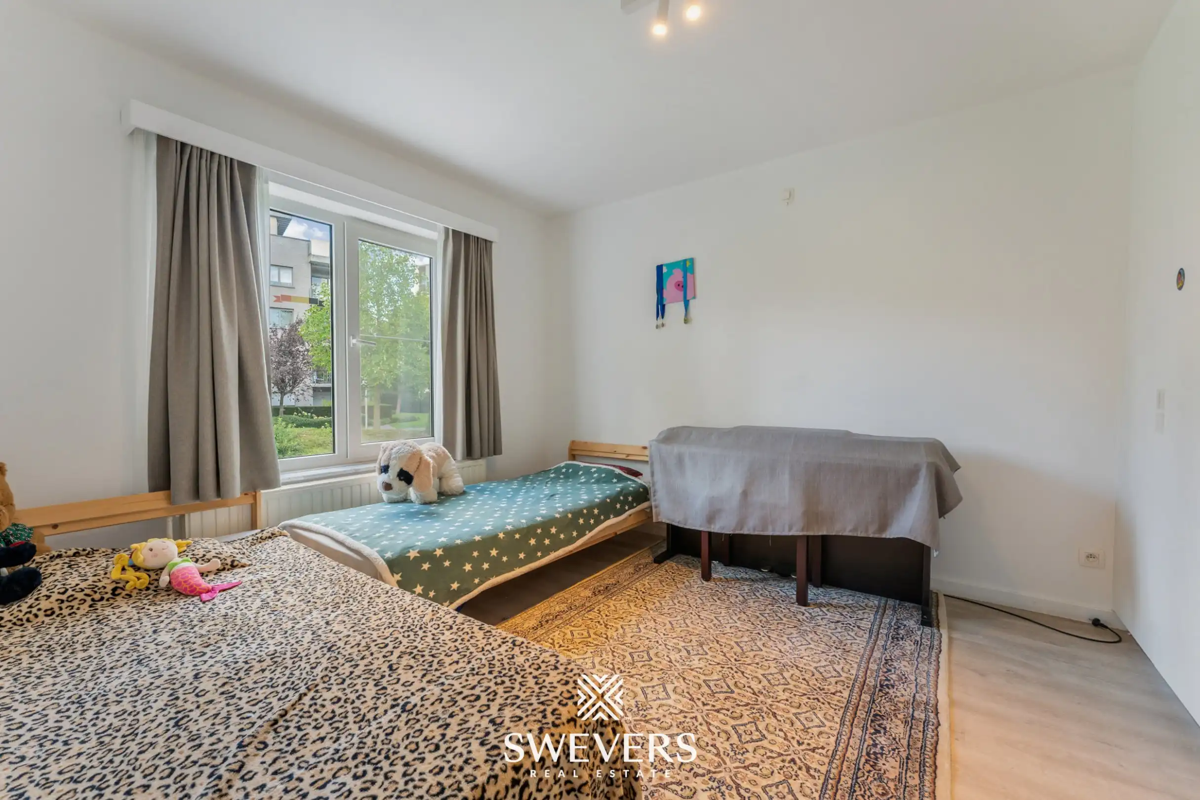 Instapklaar gelijkvloers 3-slaapkamerappartement met autostaanplaats en kelderberging nabij Hasselt-centrum foto 16