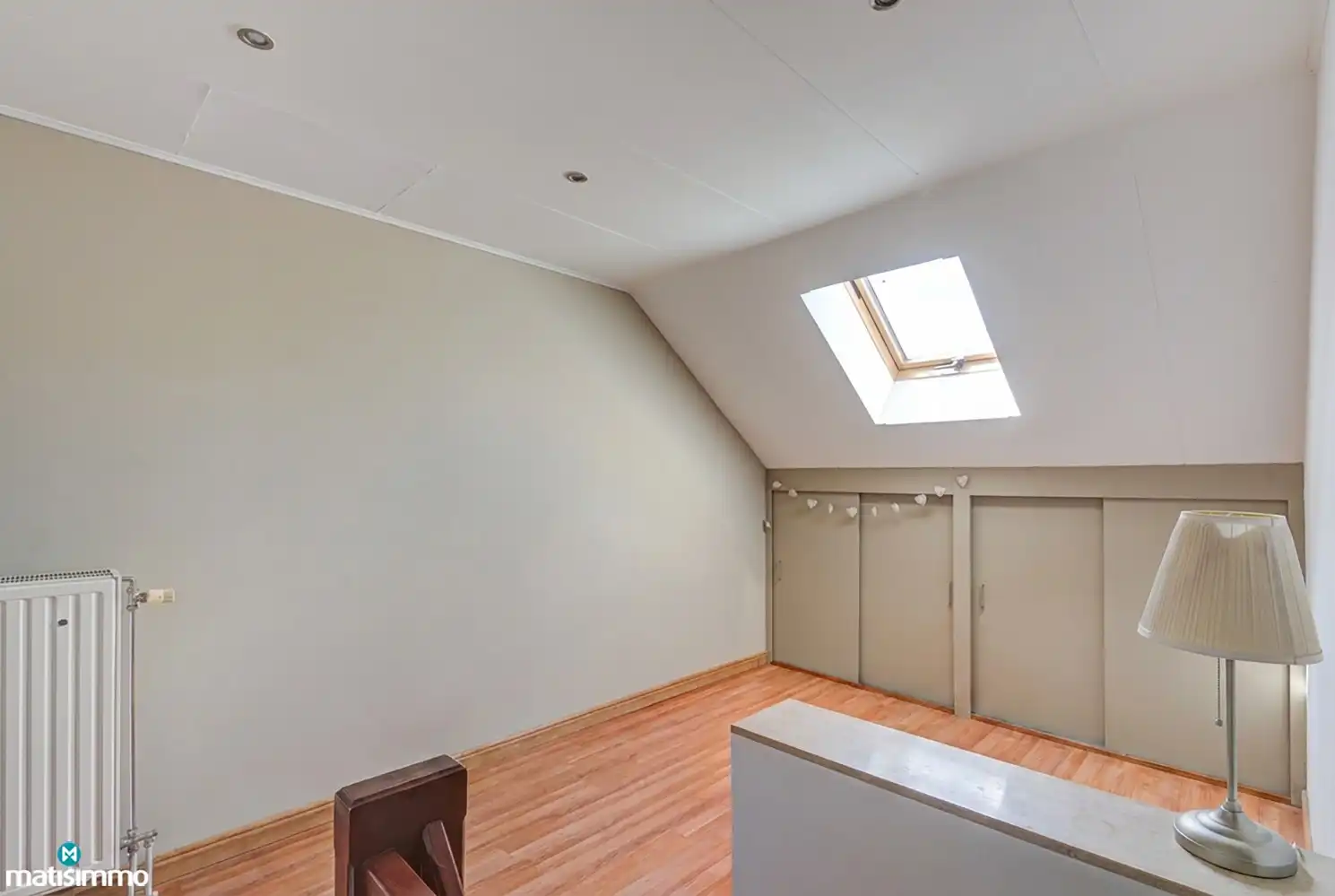 KARAKTERVOLLE EENGEZINSWONING MET 5 SLAAPKAMERS, GARAGE, CARPORT EN TUIN NABIJ HET CENTRUM VAN BILZEN foto 24
