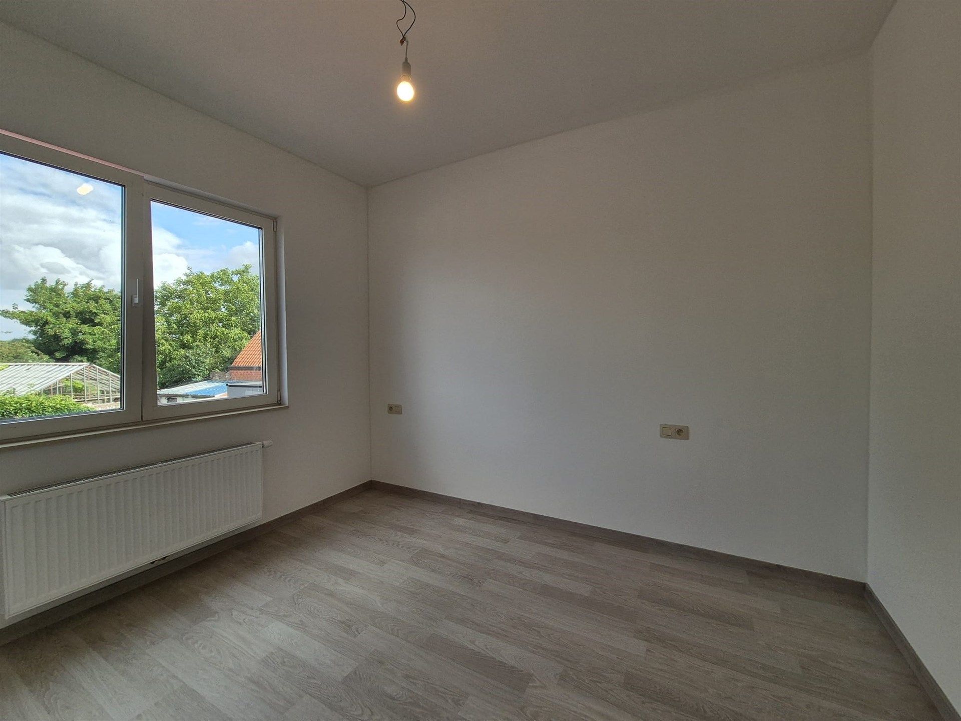 Zeer energiezuinige woning met 2 slaapkamers en tuin. foto 18