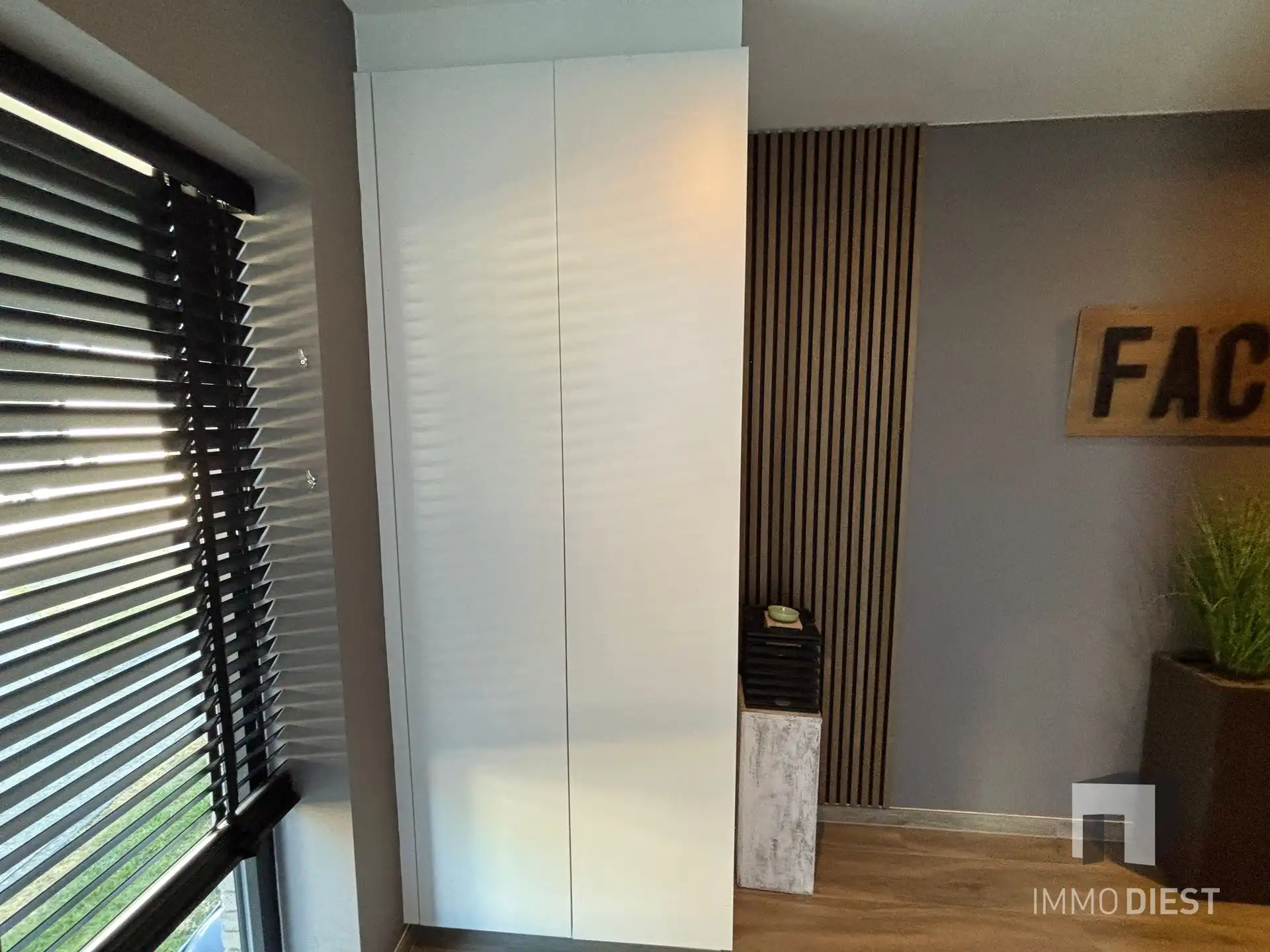 Ruim gelijkvloers appartement met open leefruimte en zonnige tuin foto 4