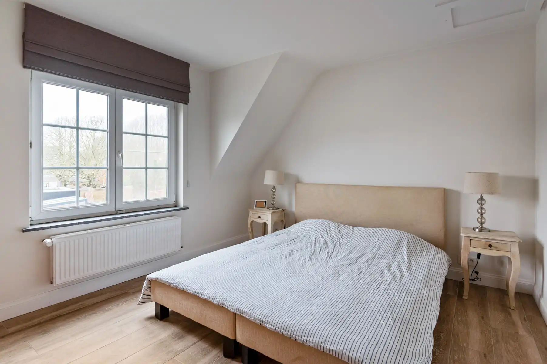 Instapklare woning met 2 slaapkamers, bureau en westgerichte tuin foto 15